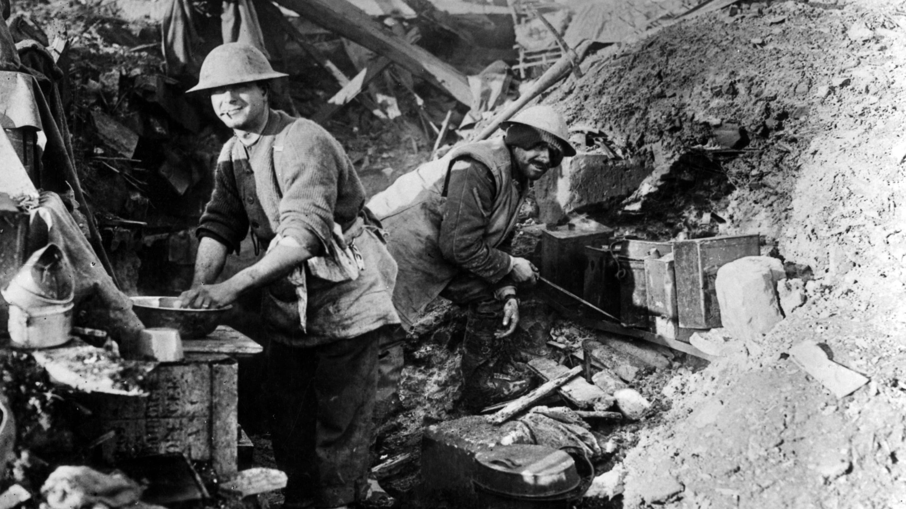 A Canadian cook with his helper at work in a battlefield cookhouse in November 1916. (Universal History Archive/UIG/Getty Images)