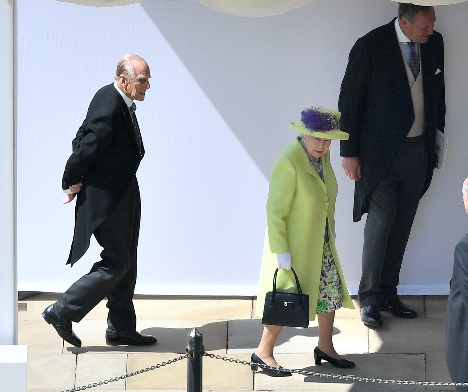 Queen Elizabeth II and Prince Philip, Duke of Edinburgh, arrive for the wedding ceremony of Britain's Prince Harry and actress Meghan Markle at St George's Chapel on May 19, 2018 in Windsor, England. (Victoria Jones - WPA Pool/Getty Images)