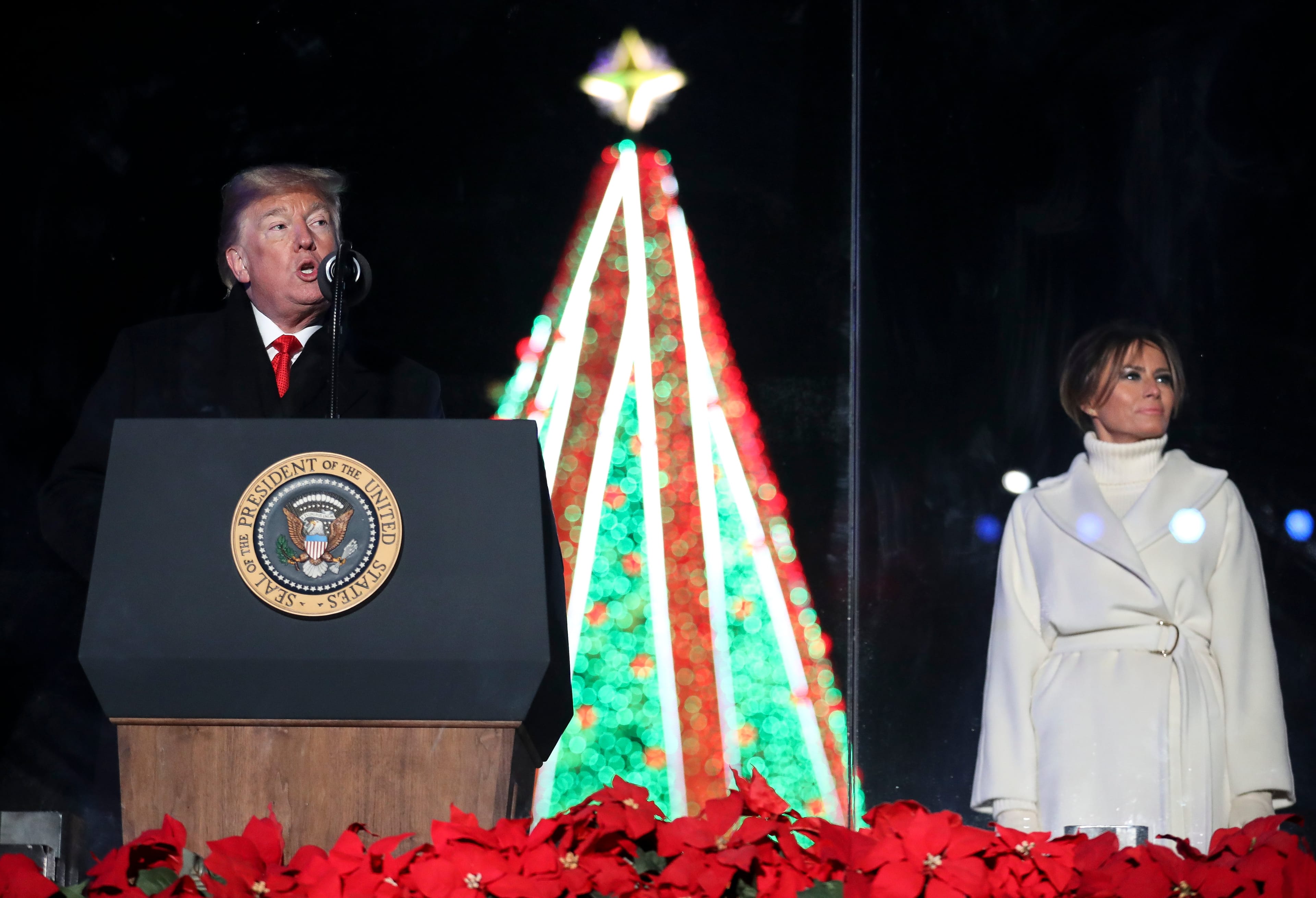 The U.S. president and first lady at the National Christmas Tree lighting ceremony in Washington (Photo: Oliver Contreras/Getty Images)