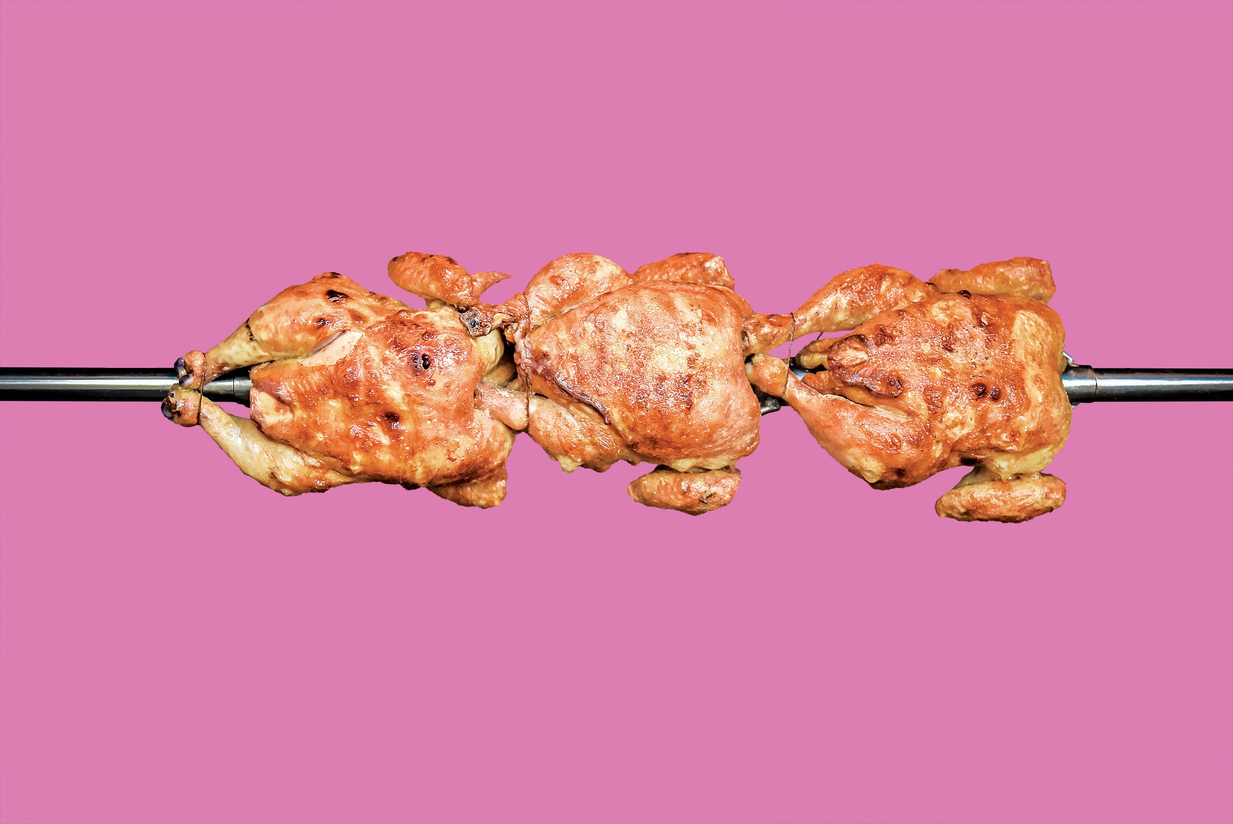 Cooking 3 rotisserie chicken on the grill with Charcoal