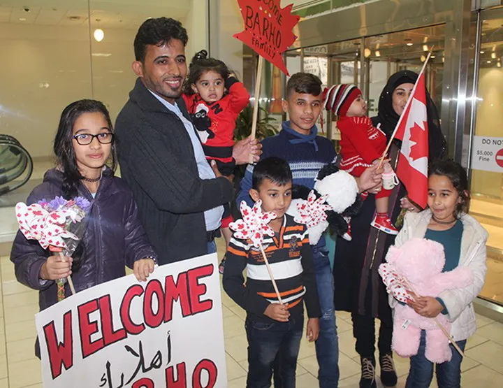 The Barho family arriving in Canada on Sept. 29 2017, at the Halifax airport. (Enfield Weekly Press-Pat Healey/CP)