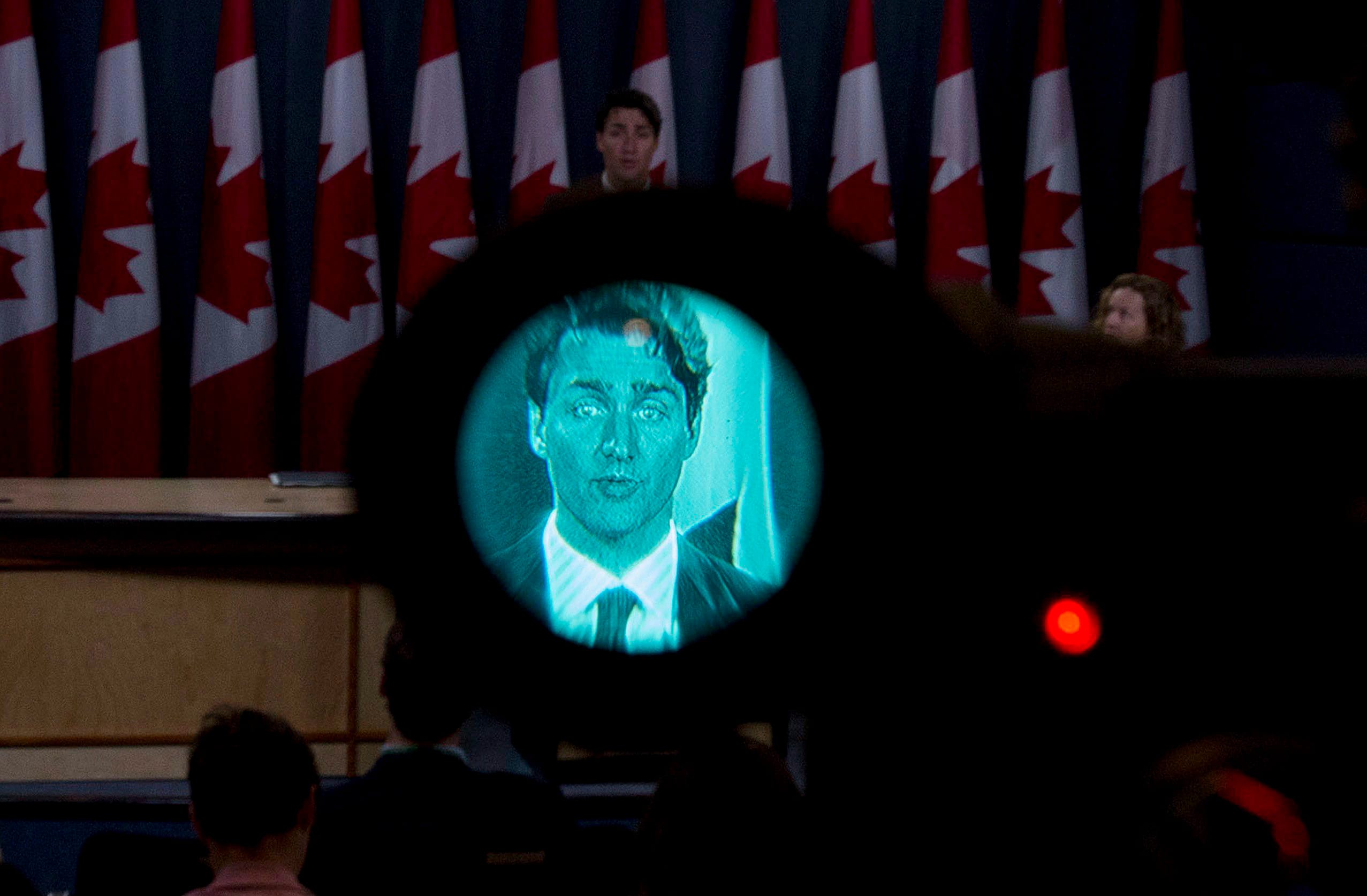 Prime Minister Justin Trudeau seen through the viewfinder of a TV camera (Justin Tang/CP)