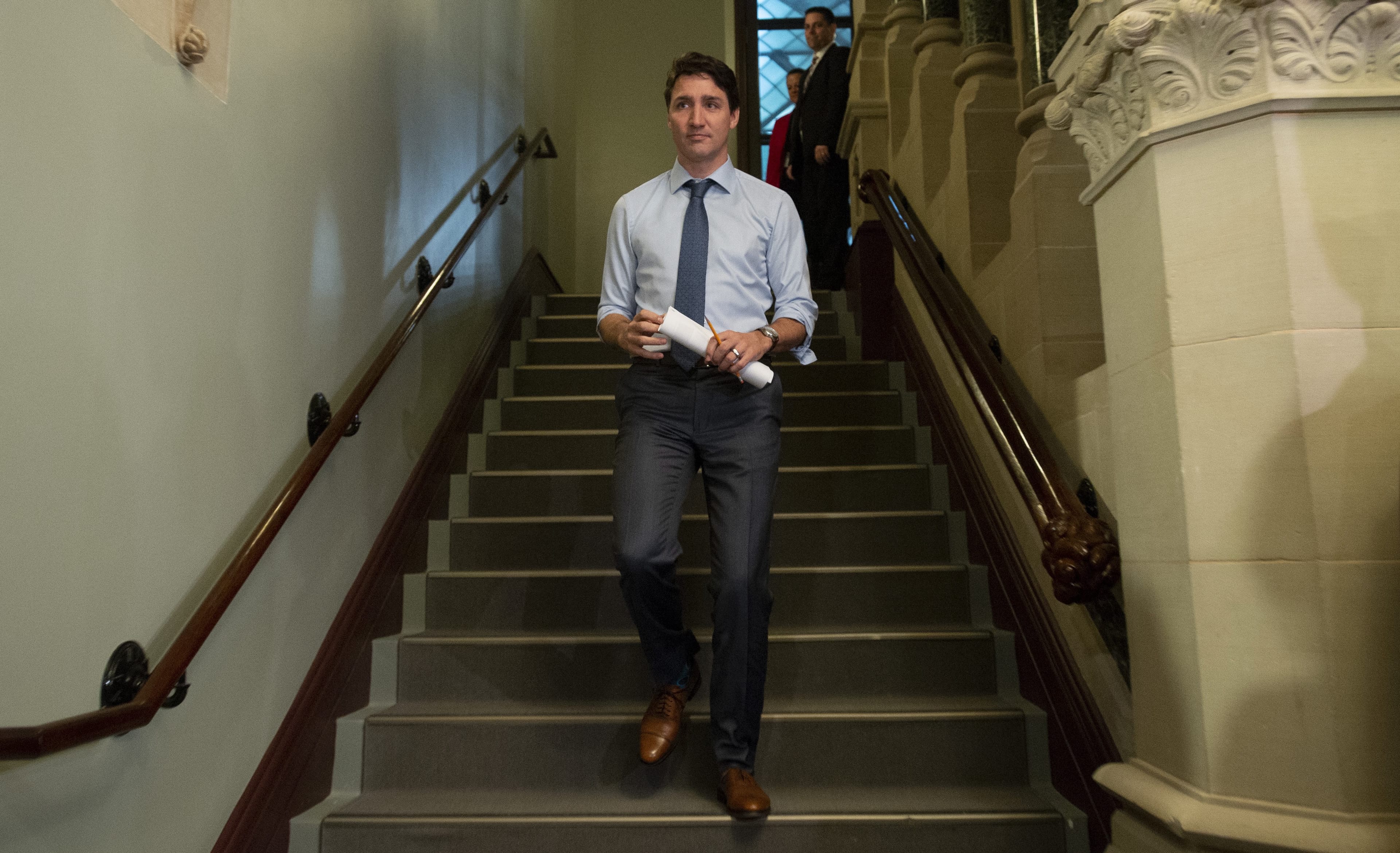 Trudeau makes his way to caucus on Parliament Hill in Ottawa, Wednesday, April 3, 2019. (THE CANADIAN PRESS/Adrian Wyld)