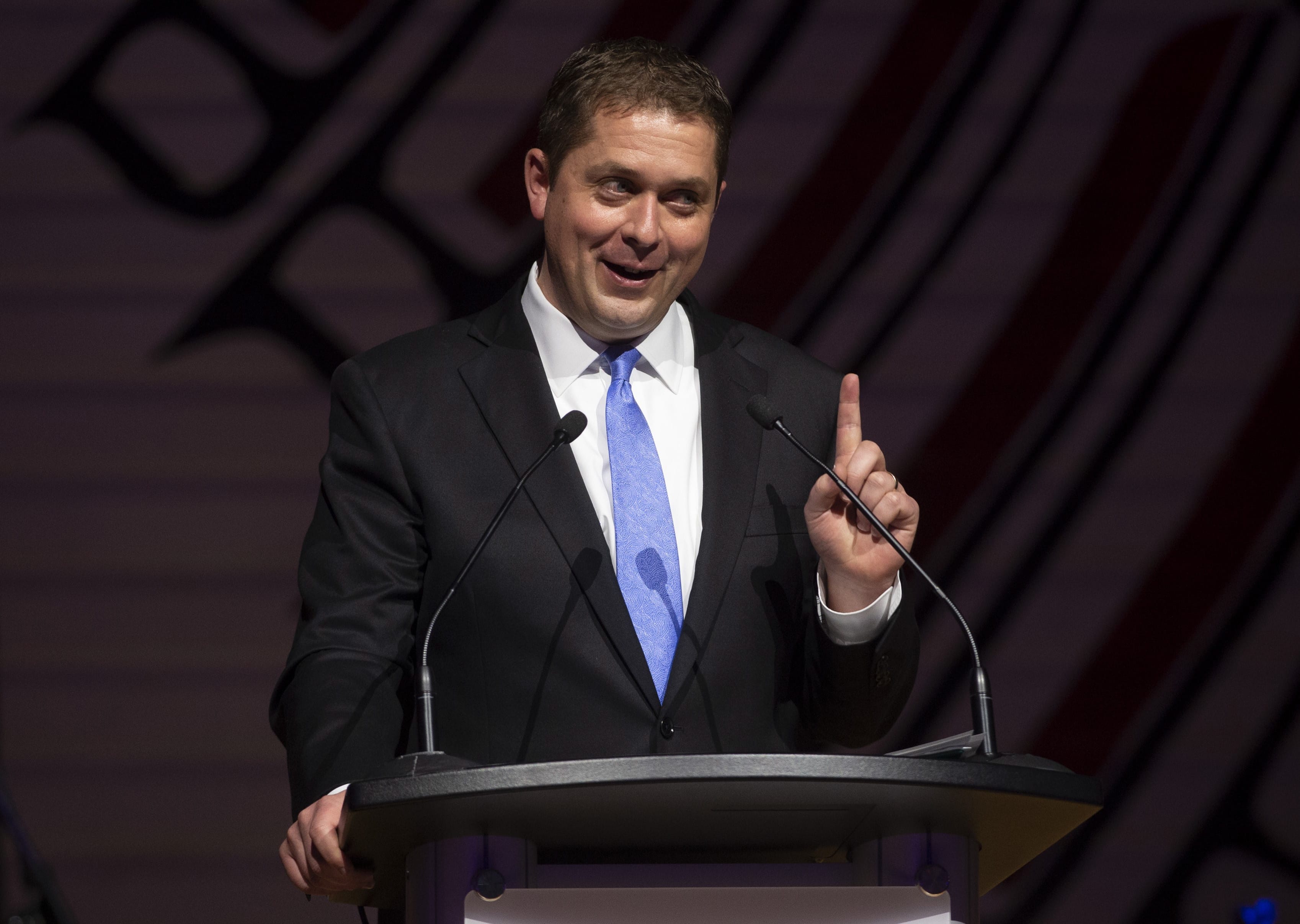 Scheer jokes during his speech at the annual Press Gallery dinner in Gatineau, Que., on Saturday, May 4, 2019. (THE CANADIAN PRESS/Adrian Wyld)