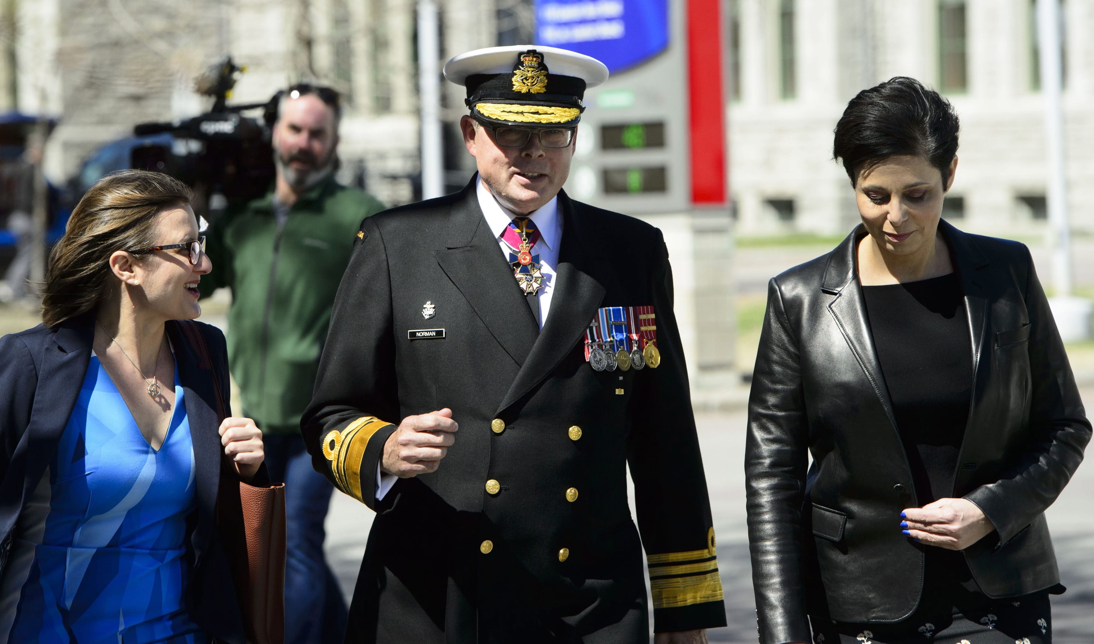 Vice-Admiral Mark Norman walks with his lawyers Marie Henein and Christine Mainville as they leave court in Ottawa on Wednesday, May 8, 2019. (Sean Kilpatrick/CP)