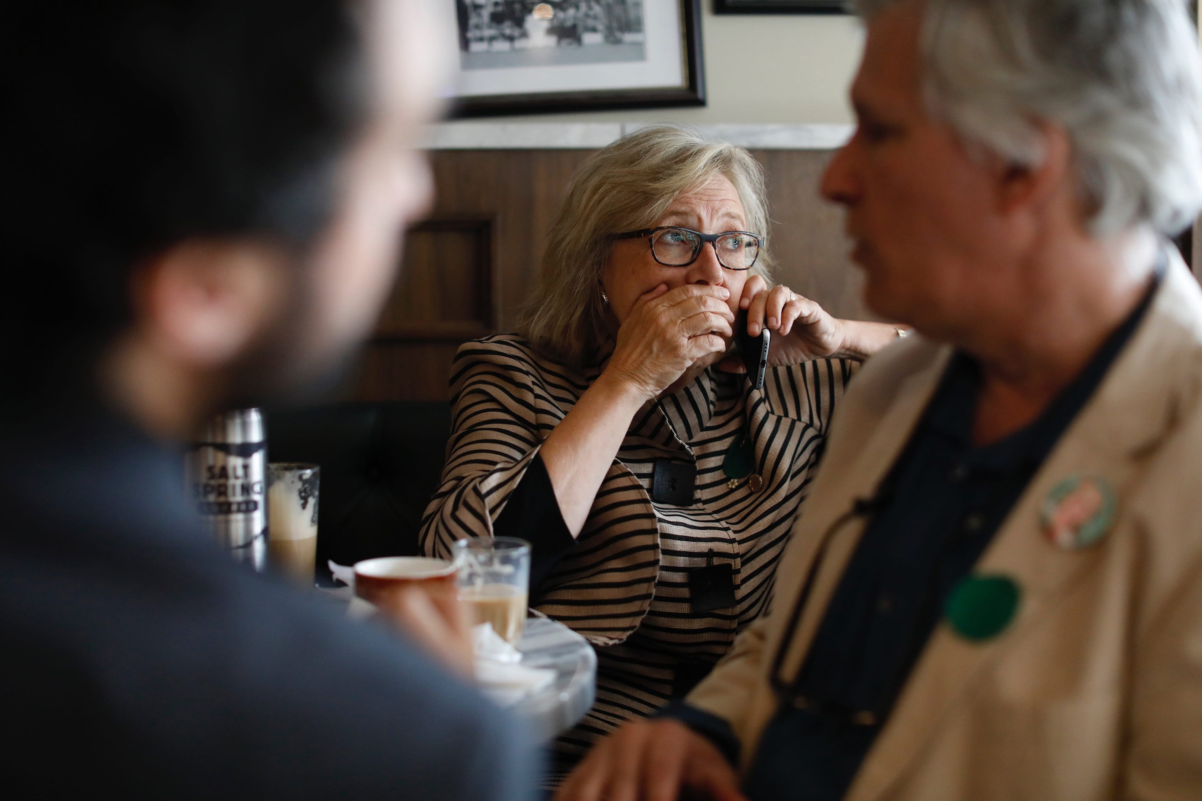 Elizabeth May in Montreal on the phone with her husband. (Photograph by Blair Gable)