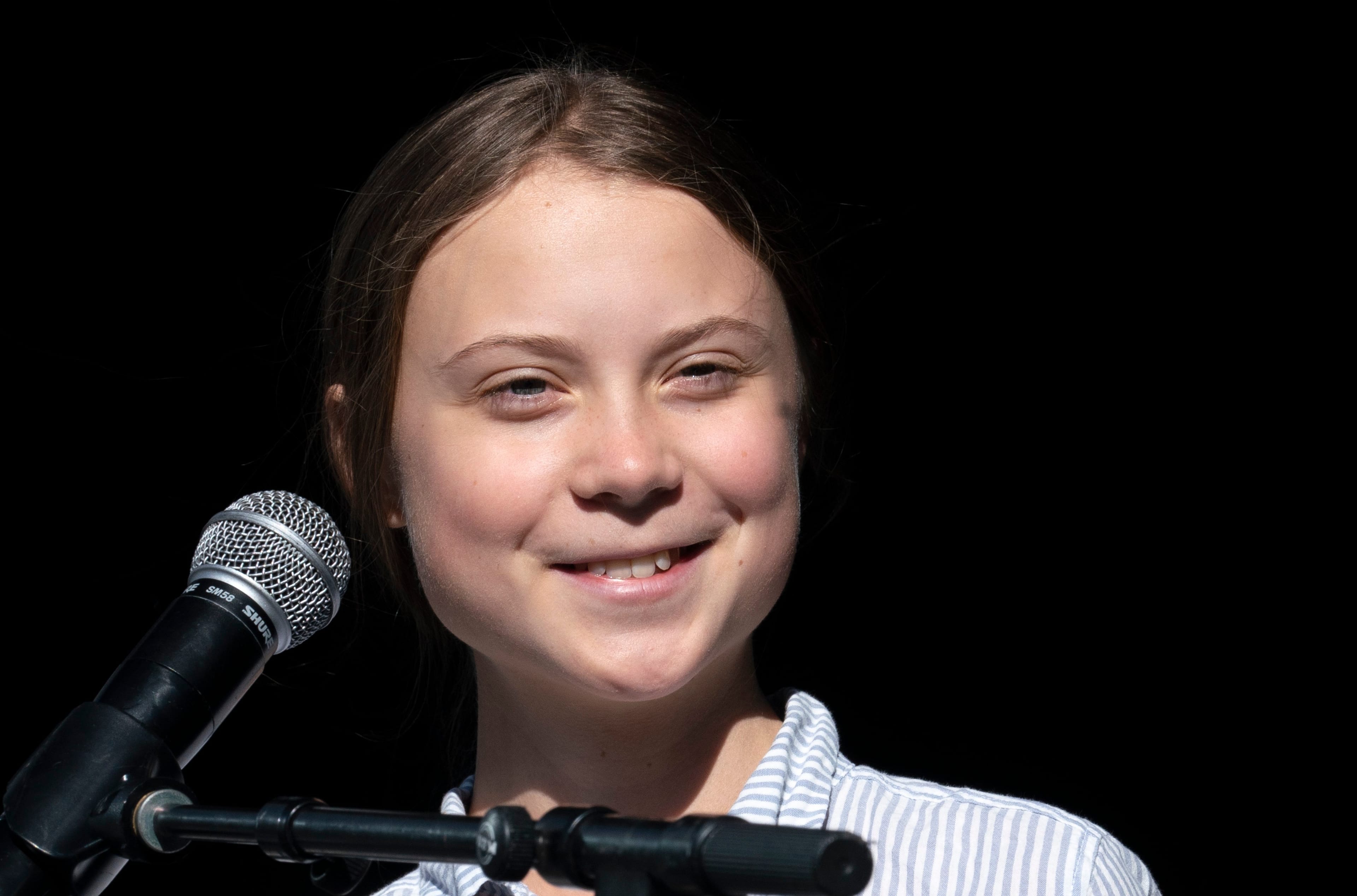 Swedish activist and student Greta Thunberg walks off the stage after addressing the Climate Strike in Montreal on Sept. 27, 2019. (CP/Paul Chiasson)