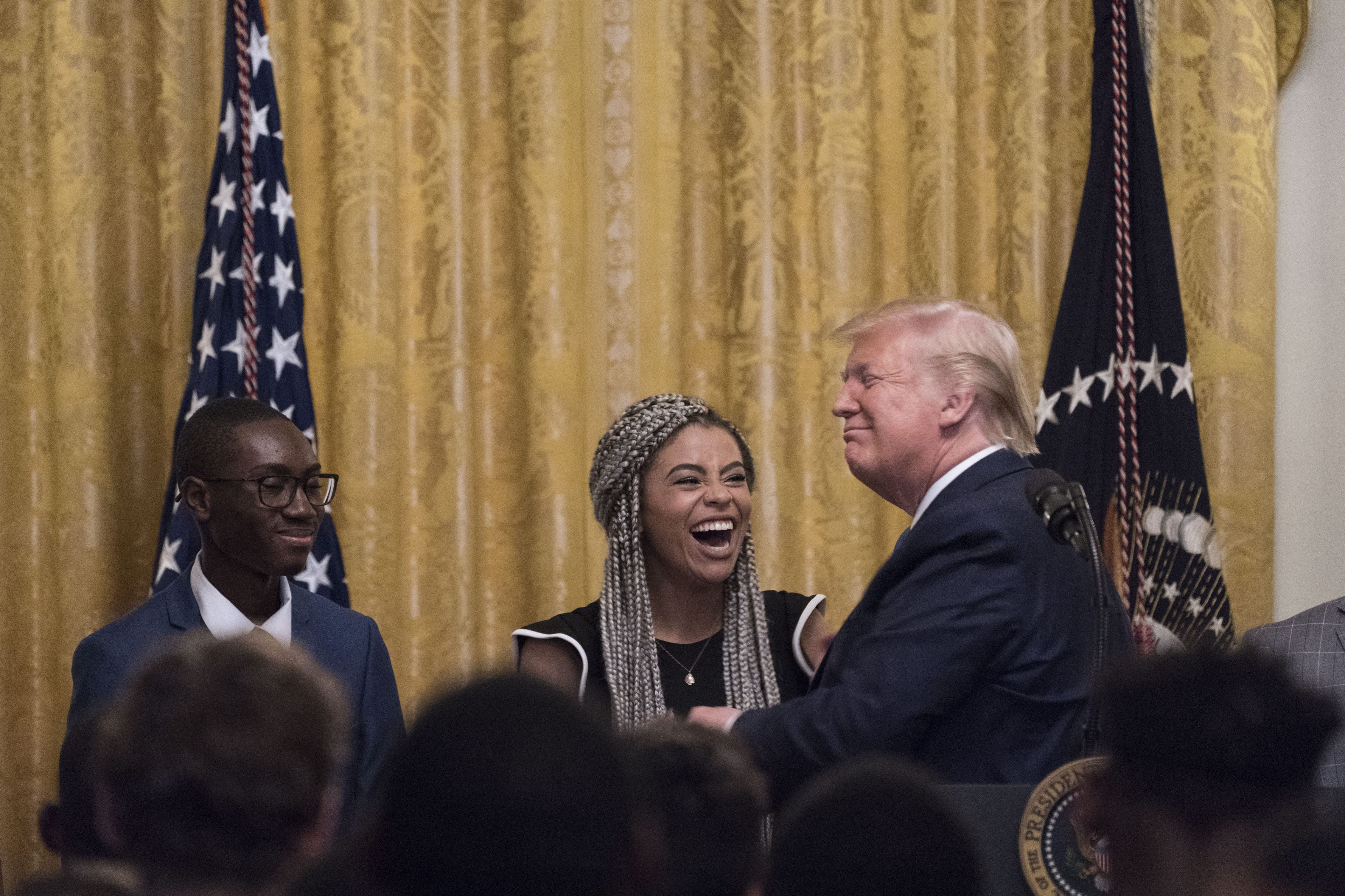 Trump greets attendees of the Young Black Leadership Summit in the East Room of the White House (Sarah Silbiger/Bloomberg via Getty)