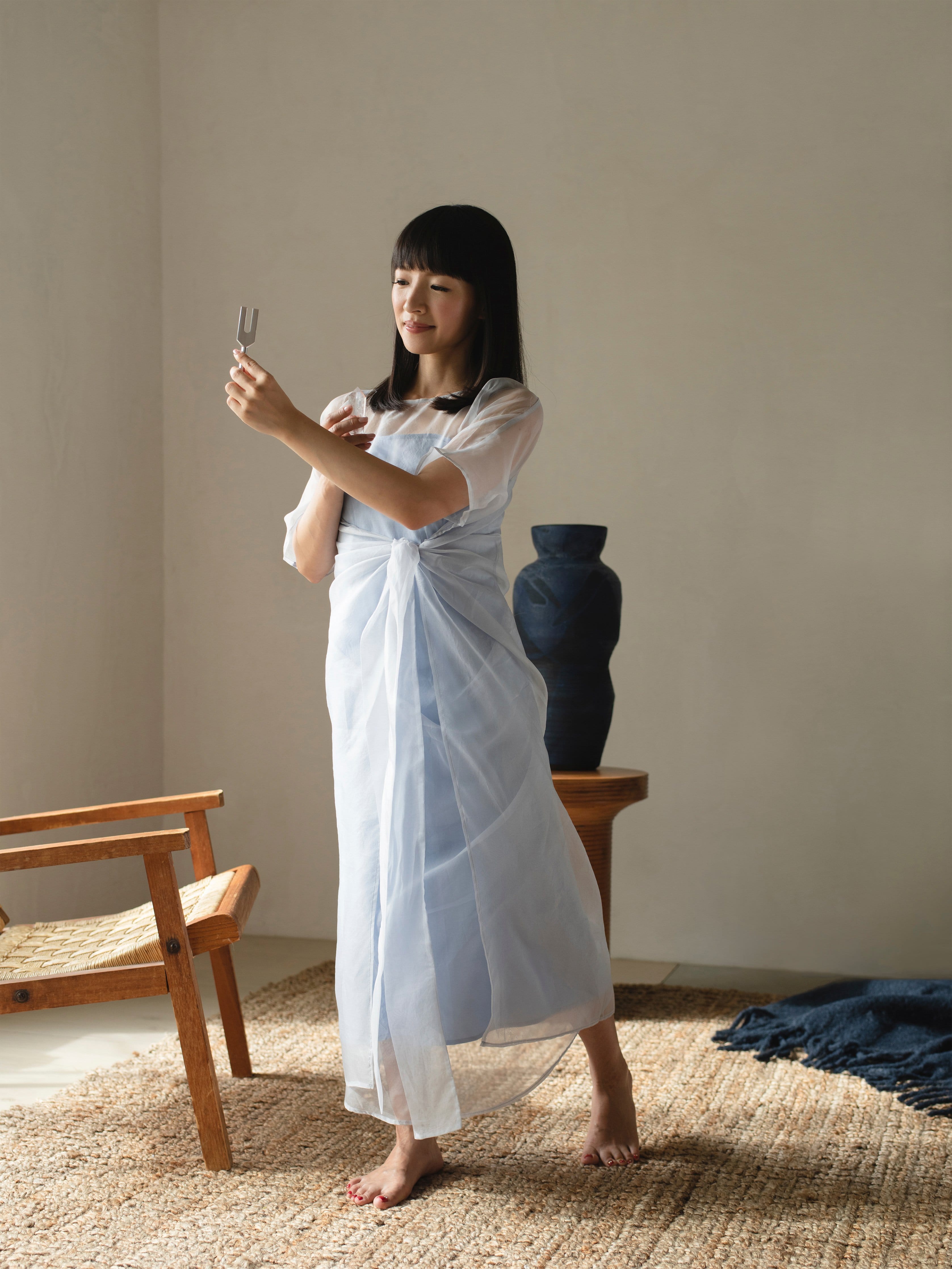 Marie Kondo holds a therapeutic tuning fork from her online store (Courtesy of KonMari Media Inc)