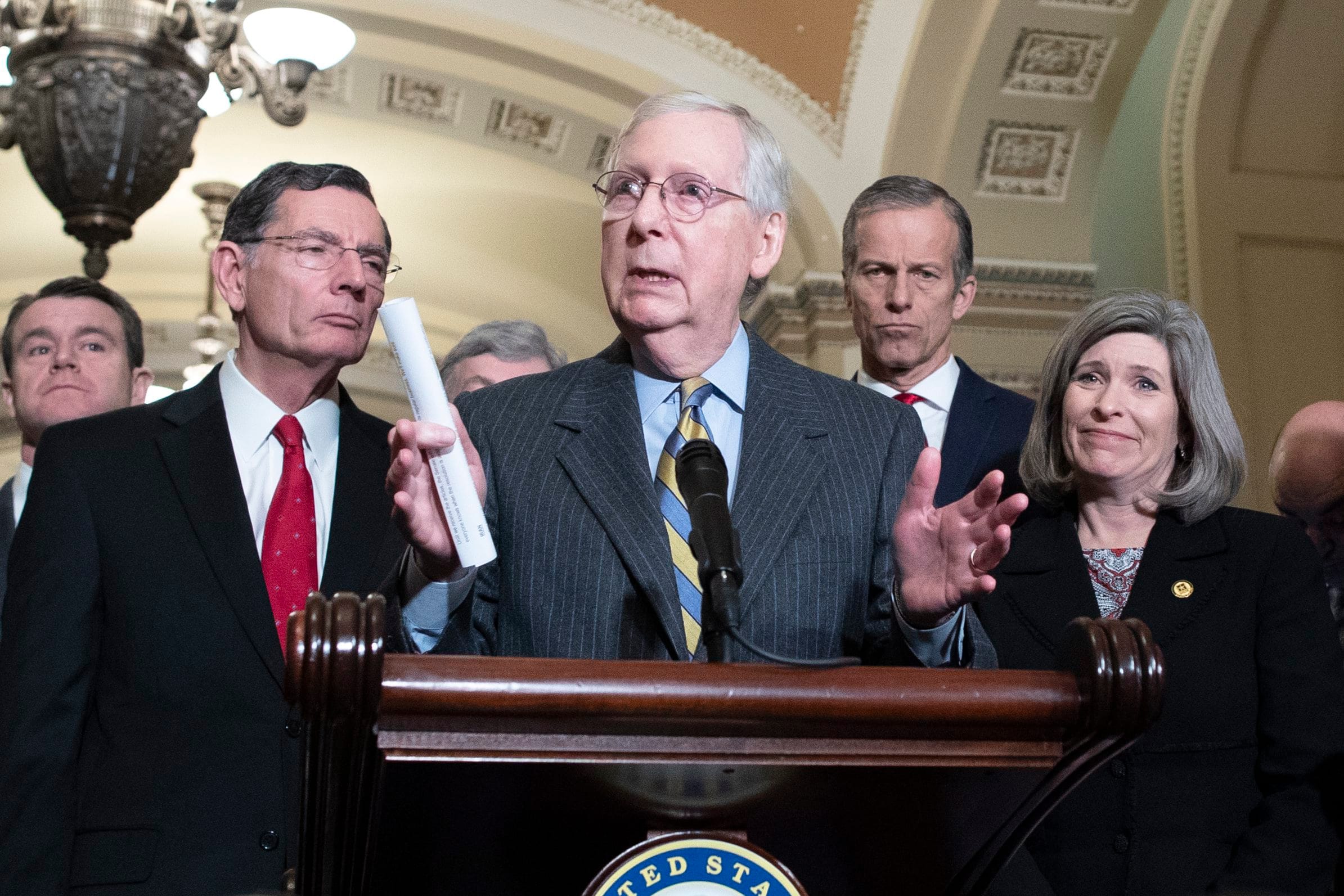 Senate Majority Leader Mitch McConnell (C) speaks to the media about the upcoming Senate impeachment trial (Michael Reynolds/EPA/CP)