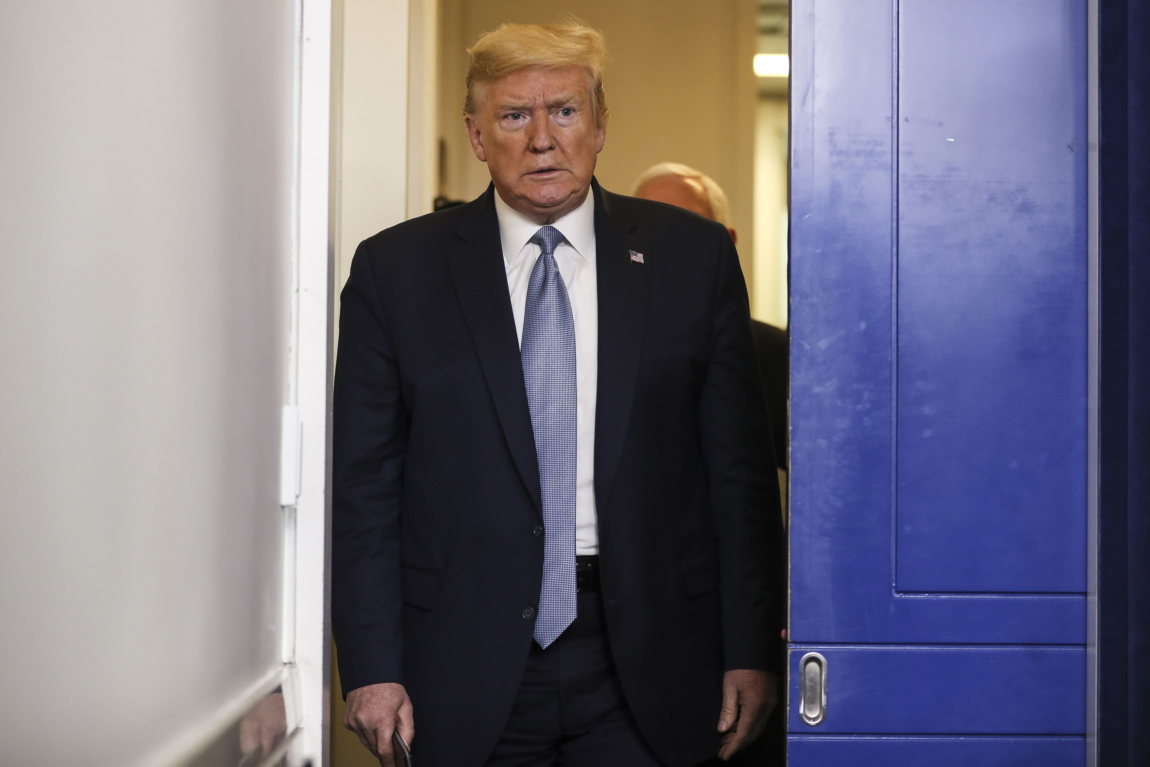 U.S. President Donald Trump arrives to a news conference in the briefing room of the White House in Washington, D.C., U.S., on Monday, March 16, 2020. (Oliver Contreras/Sipa/Bloomberg via Getty Images)