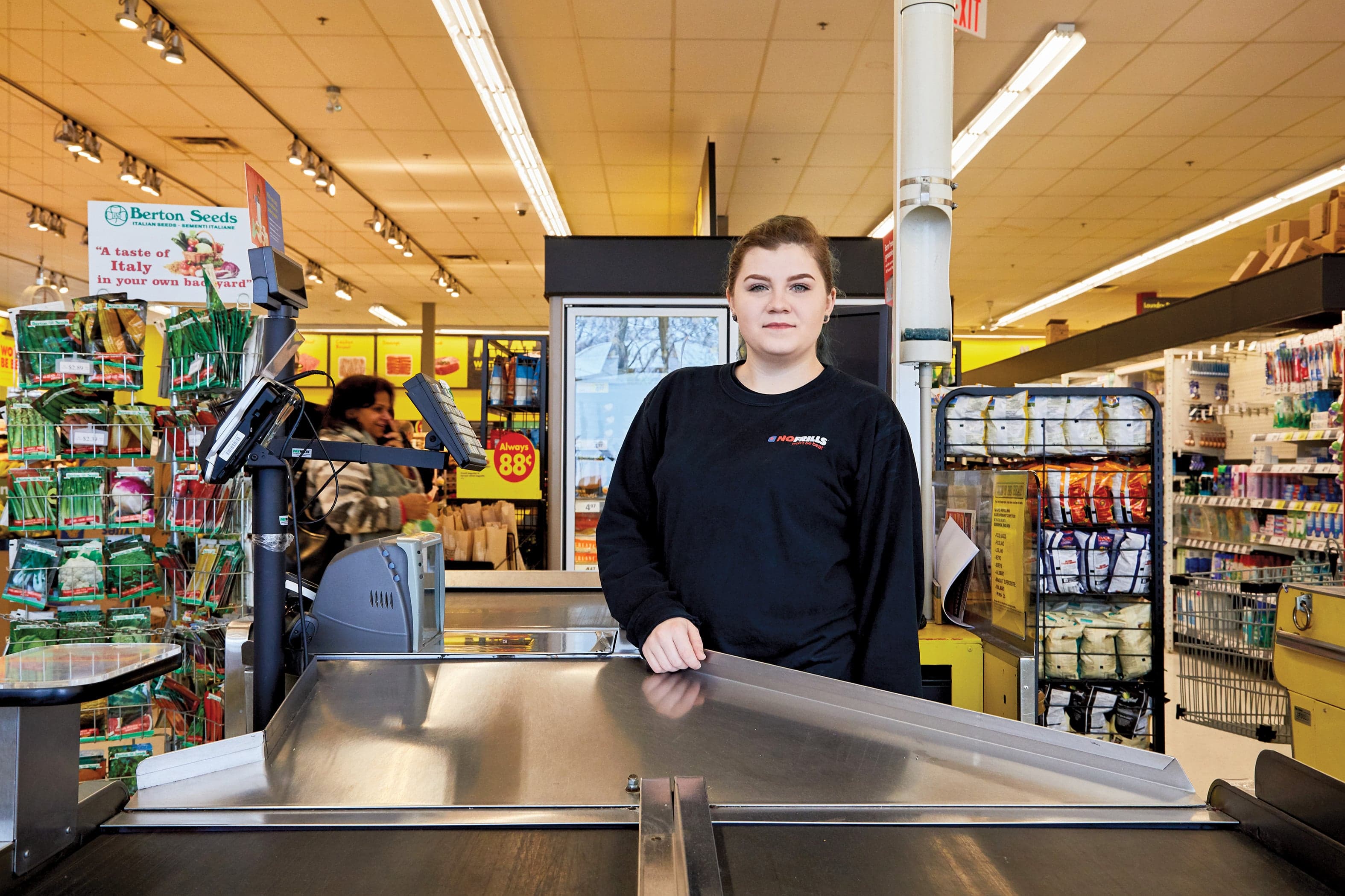 ‘I try not to touch my face. I wash my hands and sanitize as often as I can,’ says Wear, a cashier (Photograph by Christie Vuong)