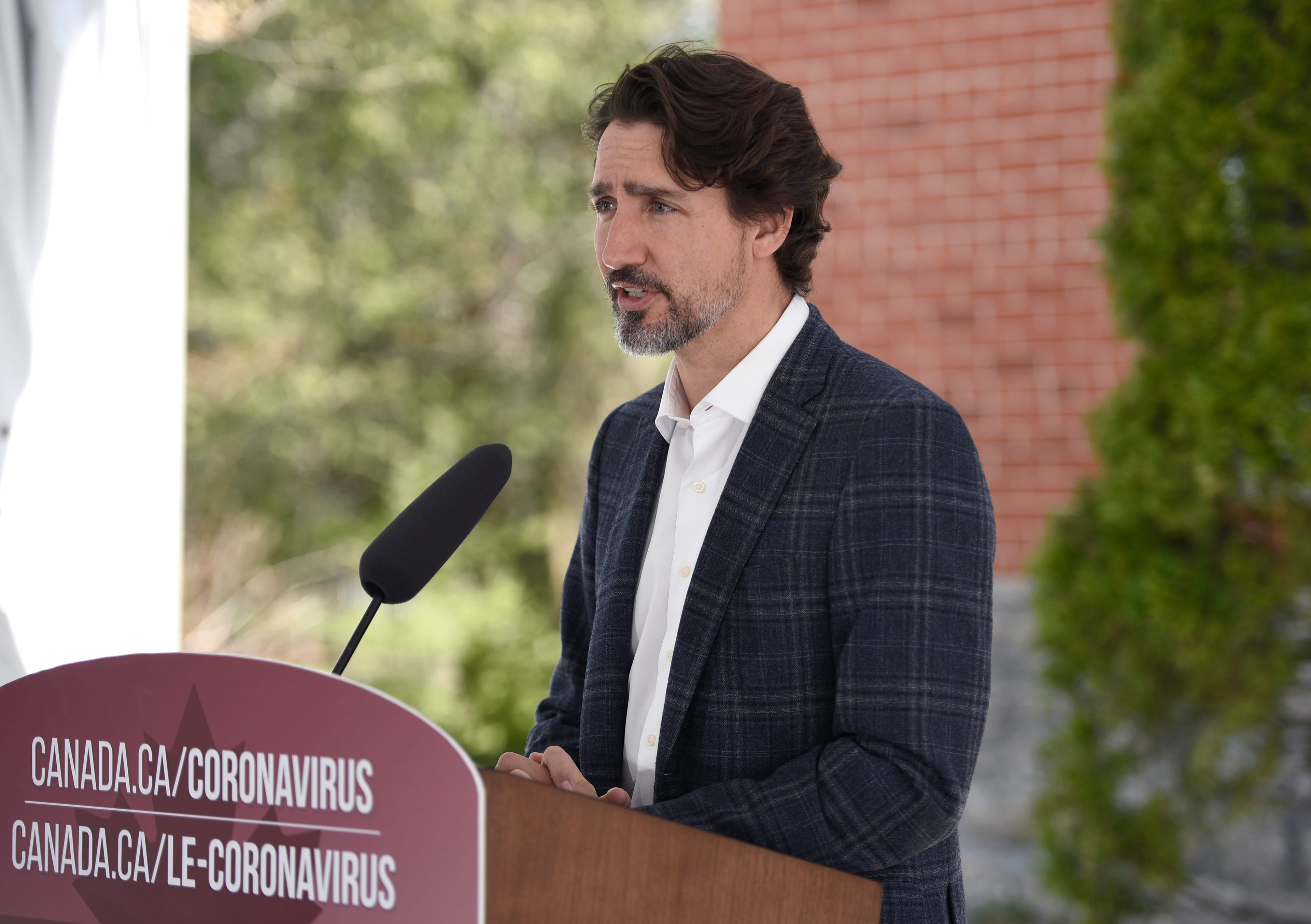 Prime Minister Justin Trudeau speaks during his daily news conference on the COVID-19 pandemic outside his residence at Rideau Cottage in Ottawa, on Sunday, May 3, 2020. THE CANADIAN PRESS/Justin Tang