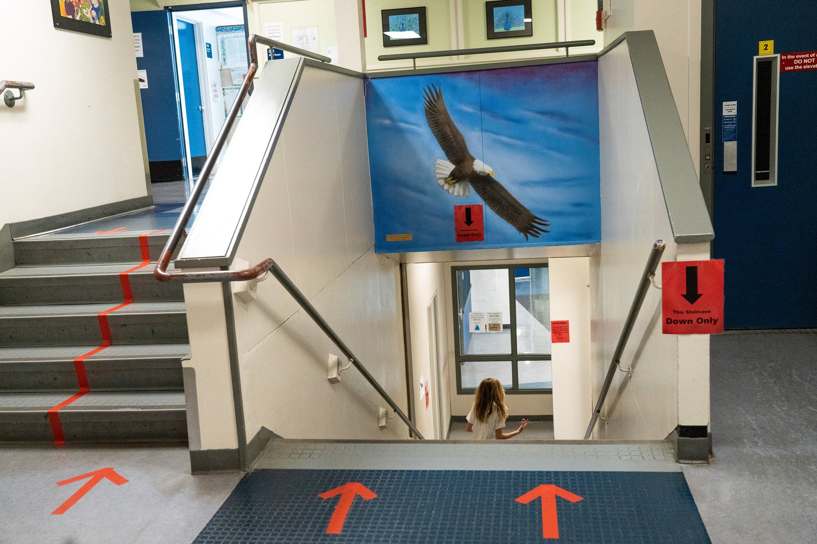 Arrows on the floor help maintain social distancing (Photograph by Jimmy Jeong)