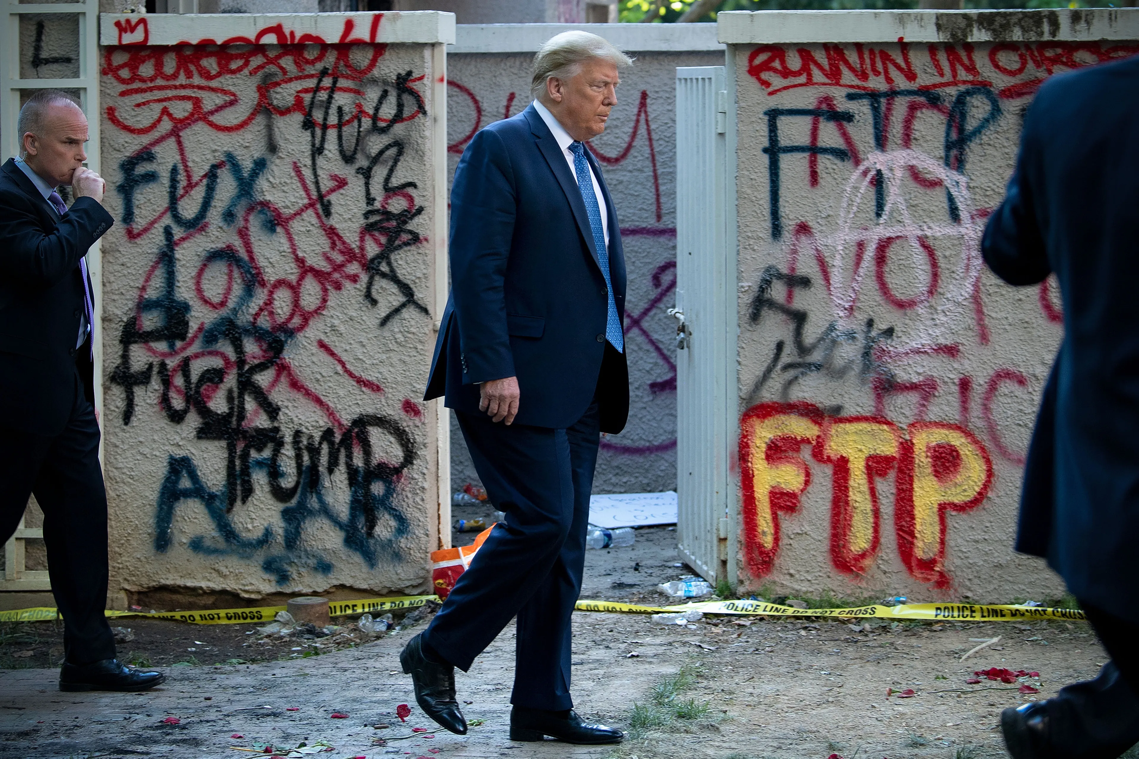 Trump walks back to the White House after appearing outside of St John's Episcopal Church on June 1, 2020 (BRENDAN SMIALOWSKI/AFP via Getty Images)