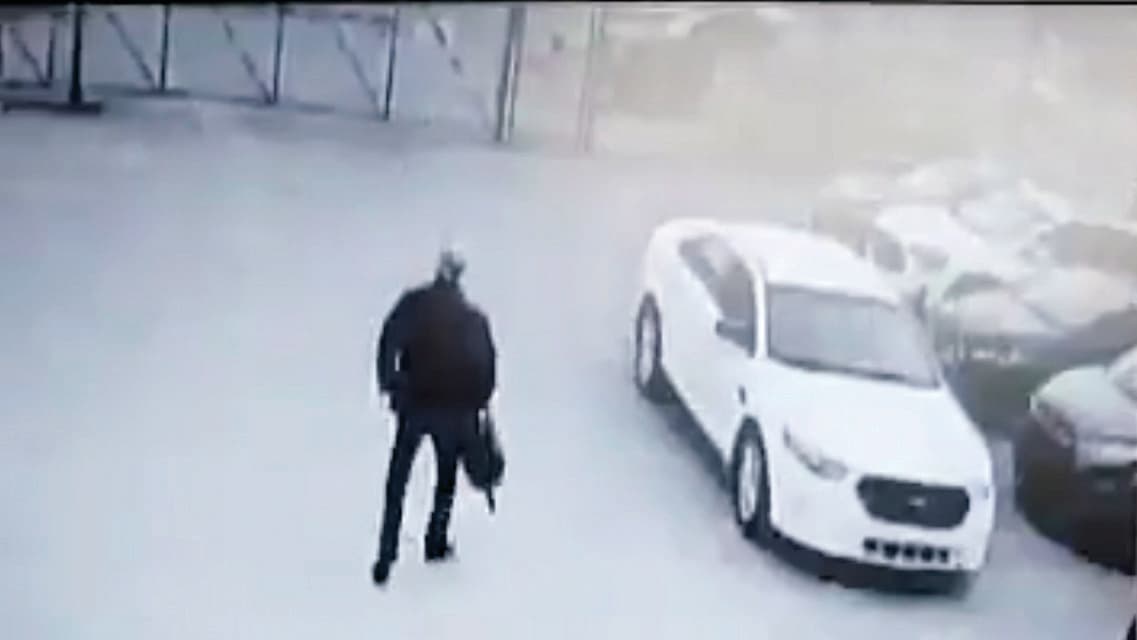 Video stills show the shooter at Brink’s making a $475,000 withdrawal on March 30