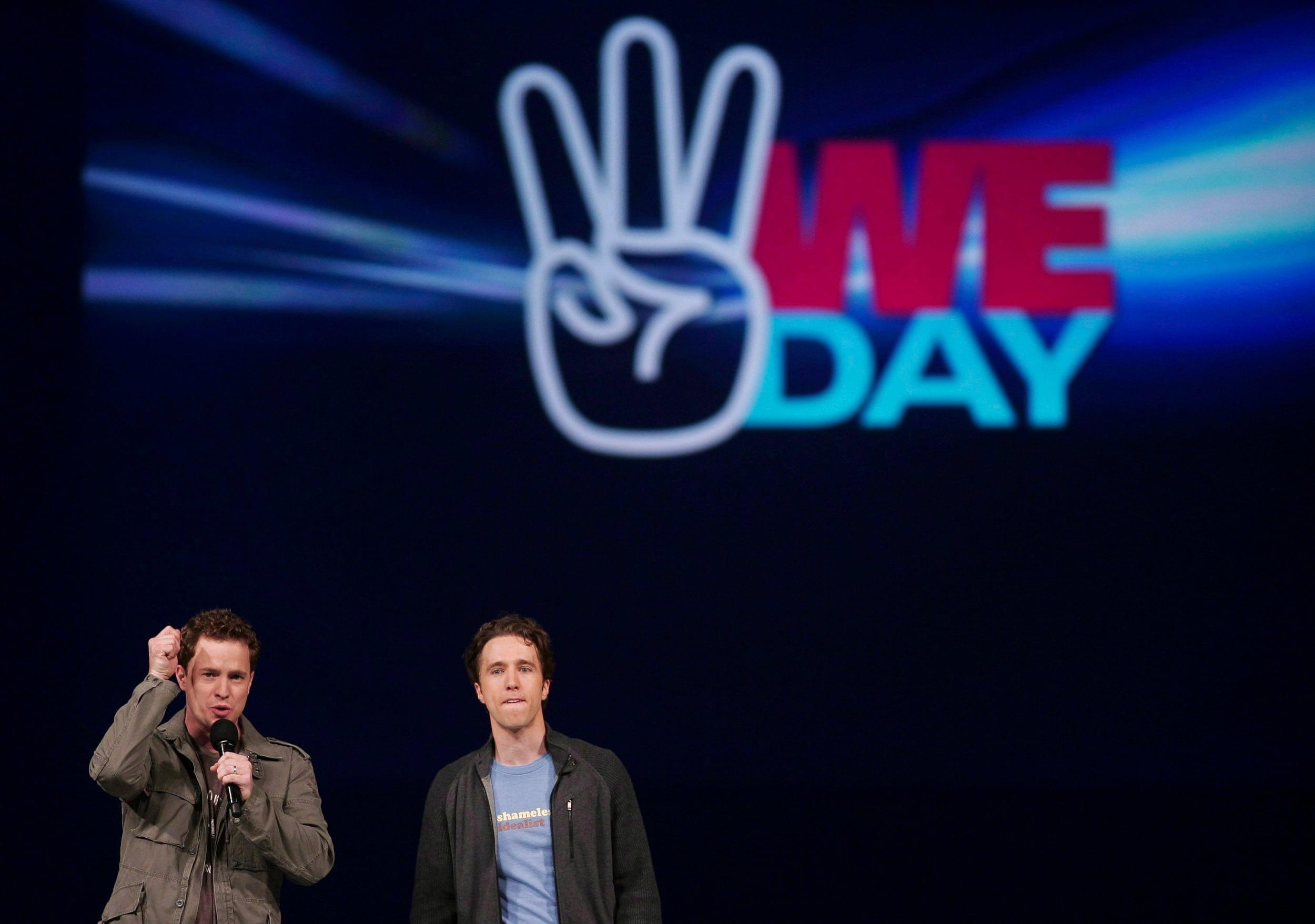 Marc, left, and Craig Kielburger, co-founders of the WE Charity, speak at the charity's celebrations in Kitchener, Ont., Thursday, Feb. 17, 2011. (Geoff Robins/CP)