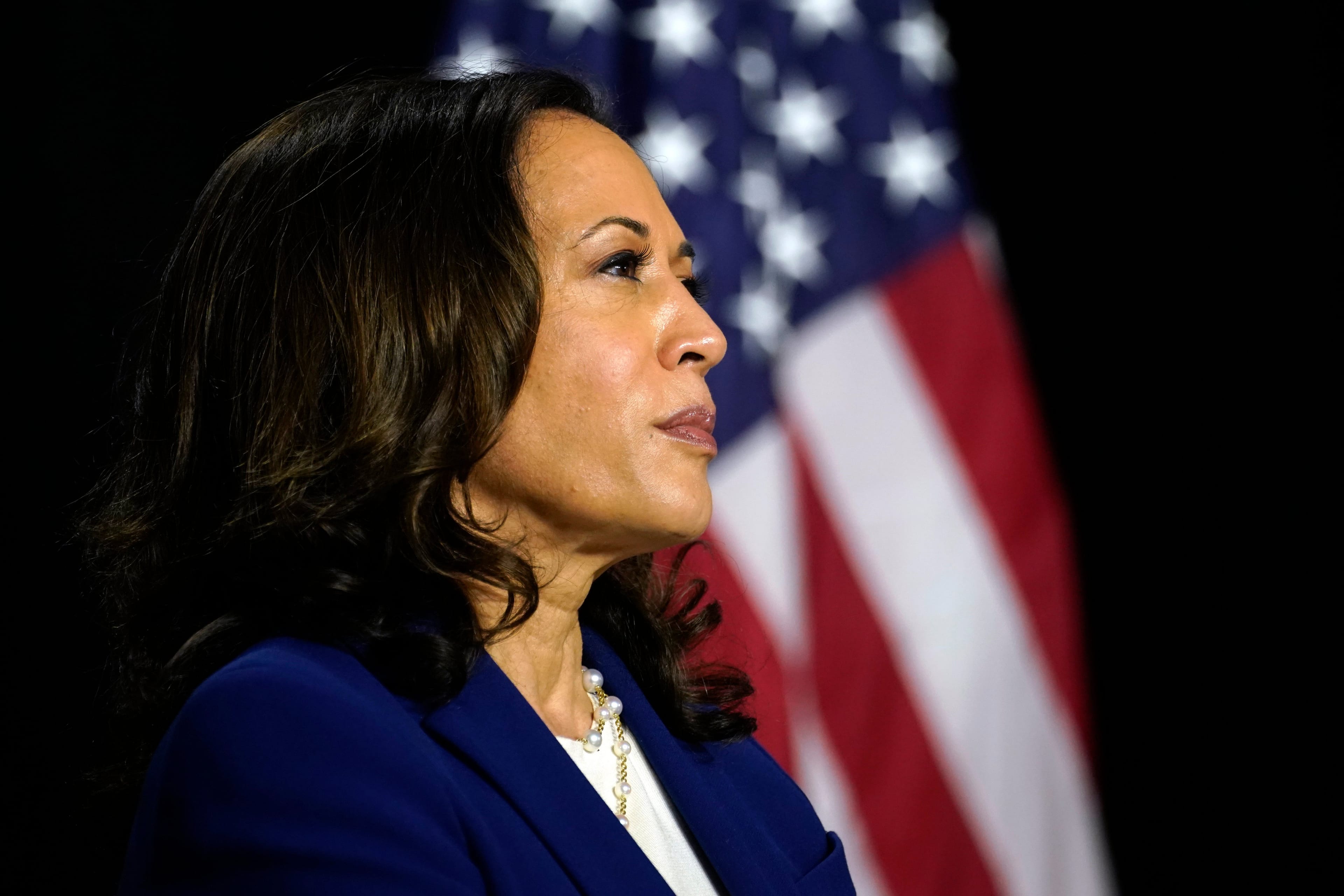 Sen. Kamala Harris, D-Calif., listens as Democratic presidential candidate former Vice President Joe Biden introduces her as his running mate in Wilmington, Del. on Aug. 12, 2020. (Carolyn Kaster/AP/CP)
