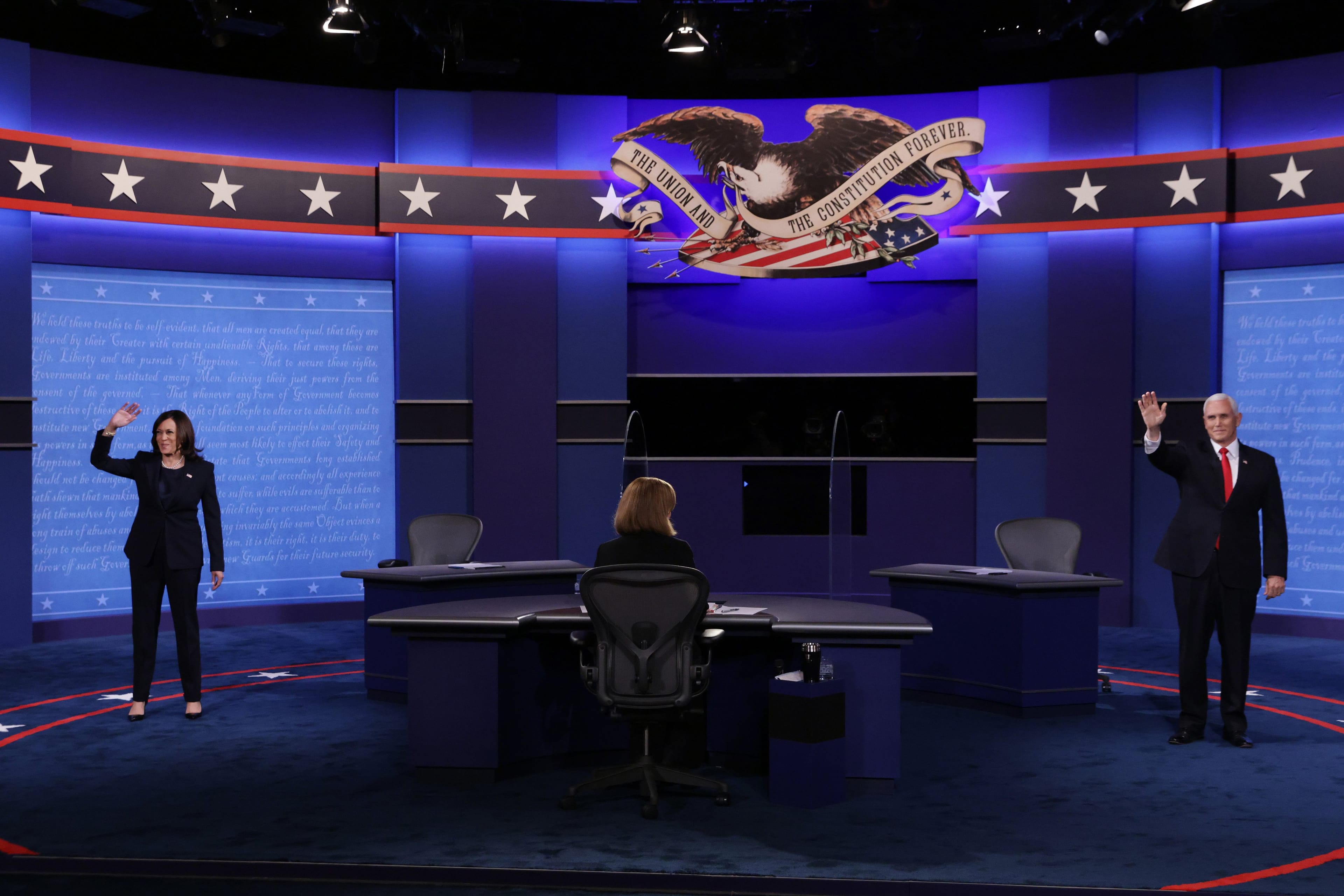Democratic vice presidential nominee Sen. Kamala Harris (D-CA) (L) and U.S. Vice President Mike Pence (R) take the stage for the vice presidential debate at the University of Utah on October 7, 2020 in Salt Lake City, Utah. The vice presidential candidates only meet once to debate before the general election on November 3. (Alex Wong/Getty Images)
