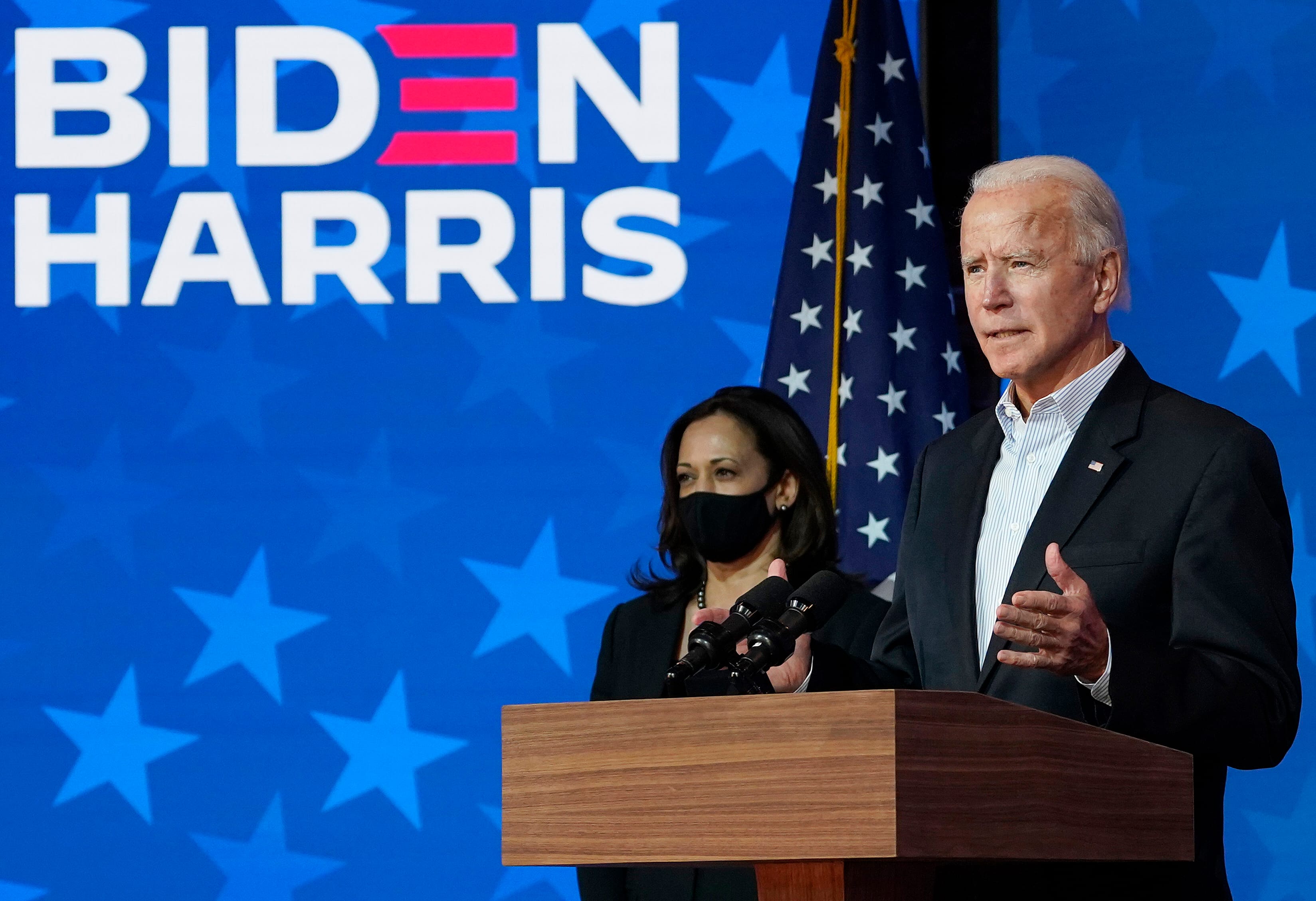 WILMINGTON, DELAWARE - NOVEMBER 05: Democratic presidential nominee Joe Biden speaks as vice presidential nominee Sen. Kamala Harris (D-CA) listens at The Queen theater on November 05, 2020 in Wilmington, Delaware. Biden attended internal meetings with staff as votes are still being counted in his tight race against incumbent U.S. President Donald Trump. The final results remain too close to call in many critical battleground states. (Photo by Drew Angerer/Getty Images)