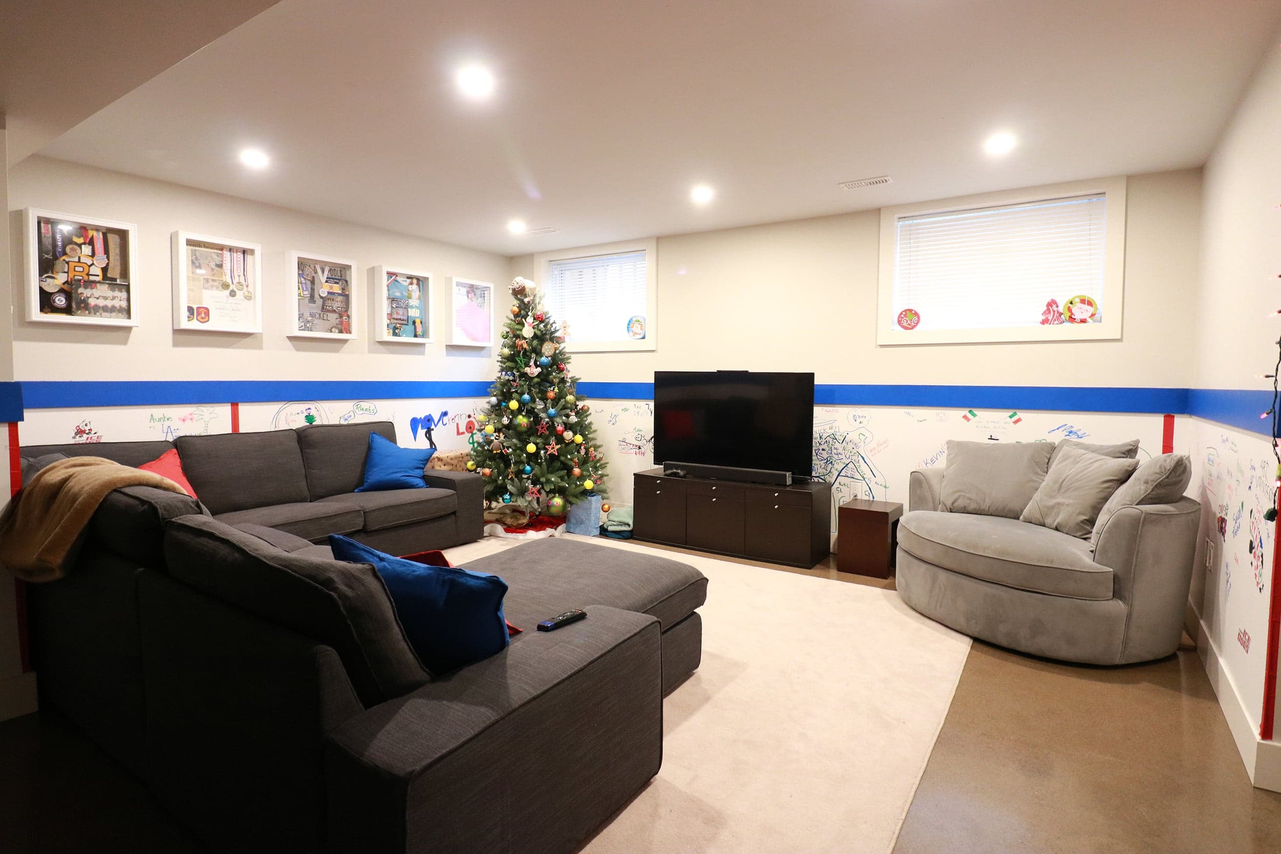 Nickel's basement space was originally open with concrete floor and hockey boards on the walls—a space for the kids to run around and play hockey (Courtesy of Jen Nickel)
