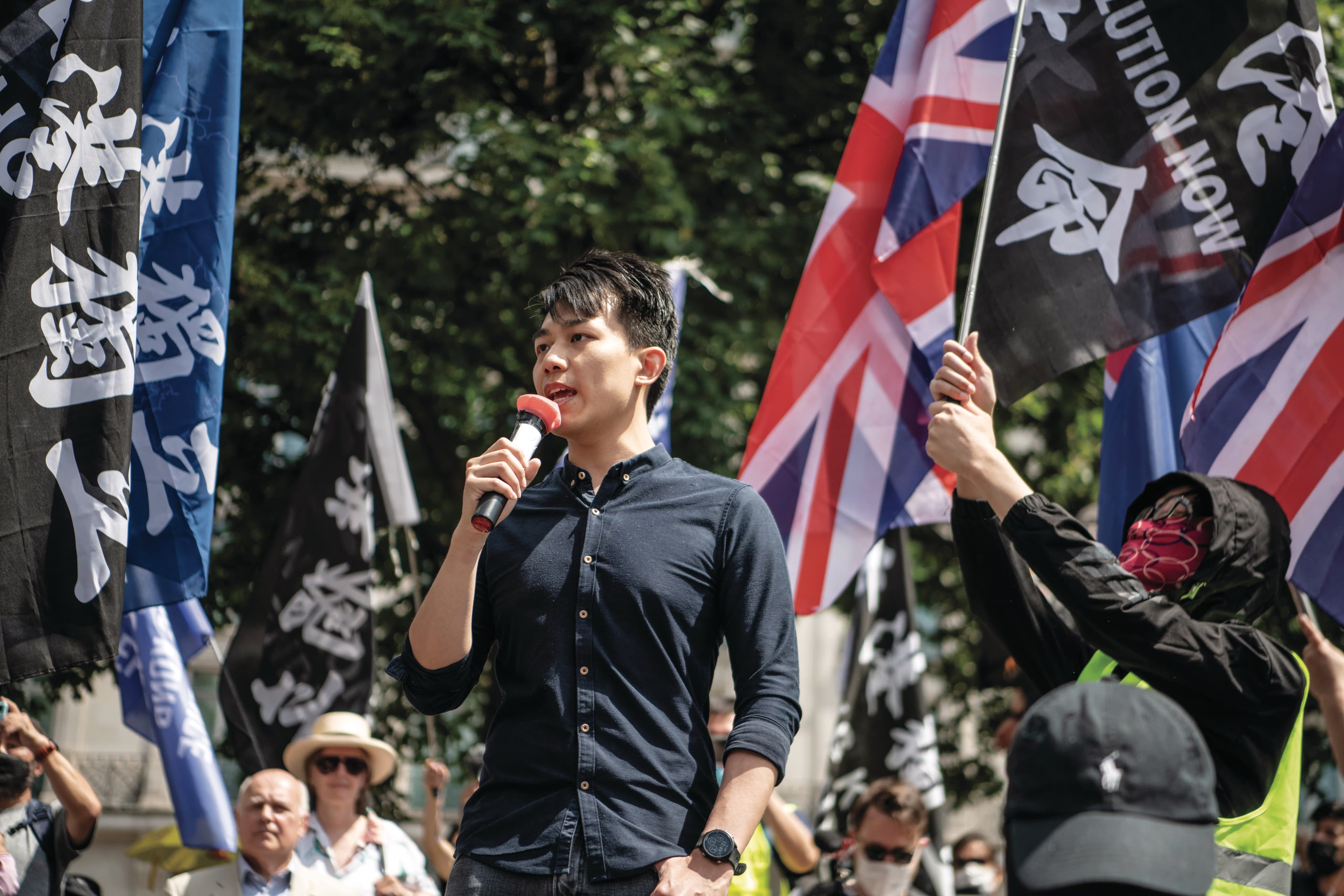 Activist Lau speaks at a rally for Hong Kong democracy in London on June 12, 2021 (Laurel Chor/Getty Images)