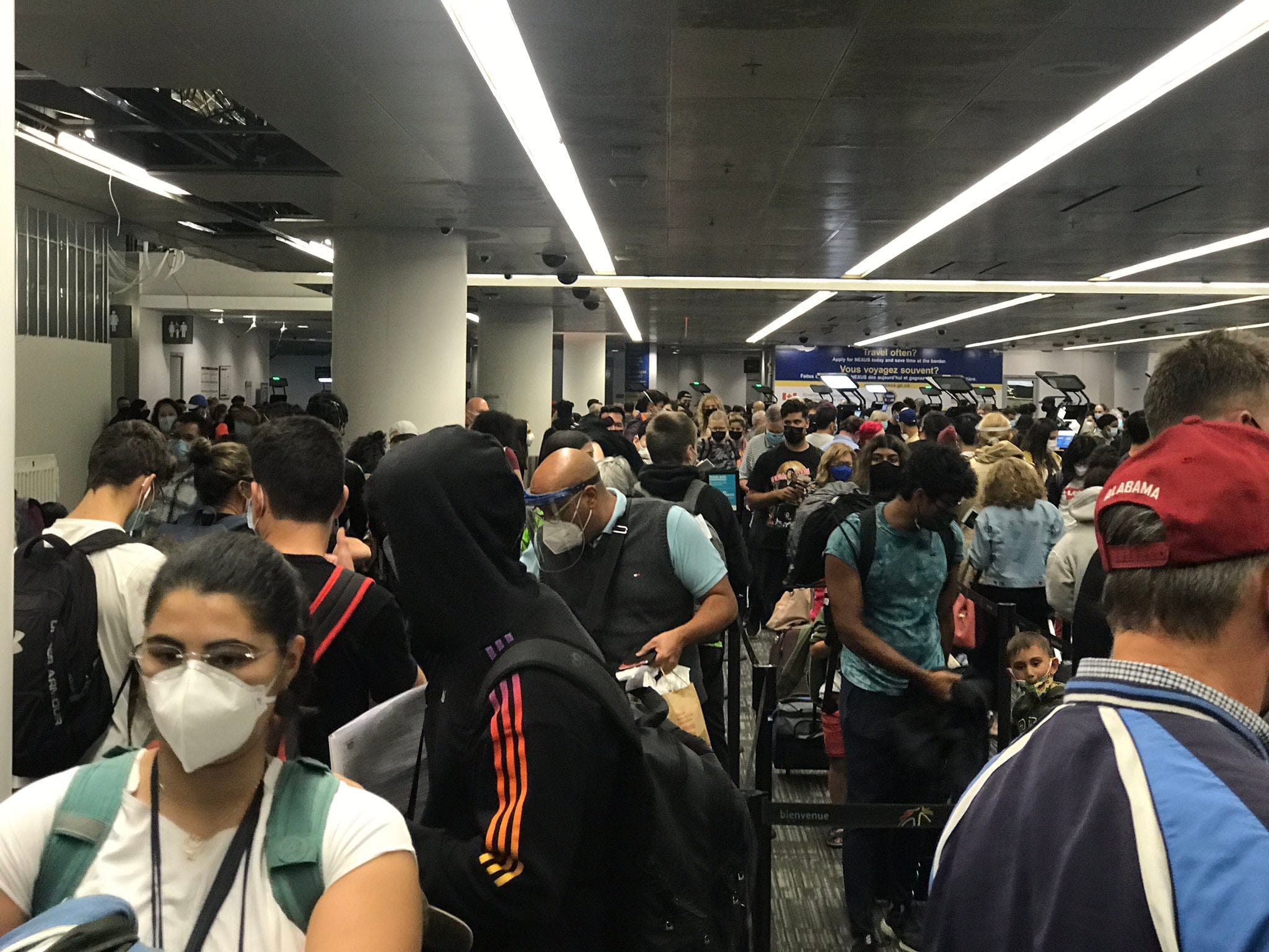 @profamirattaran Tweeted, “Has federal Canada, which is responsible for airports, learned nothing in nearly two years of pandemic? Look at this.” (Courtesy of Amir Attaran/Twitter)