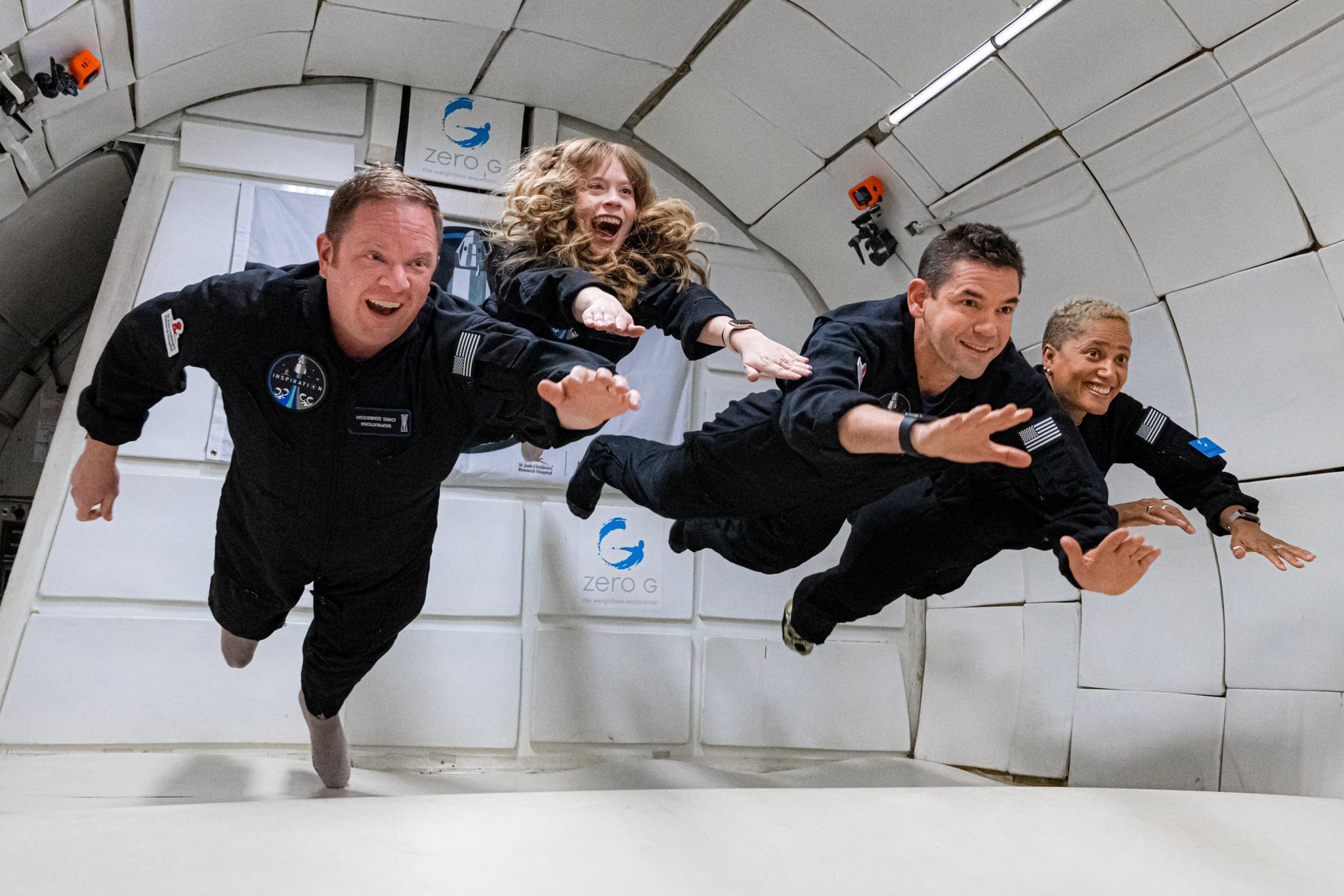 COUNTDOWN: INSPIRATION4 MISSION TO SPACE (L to R) CHRIS SEMBROSKI, HAYLEY ARCENEAUX, JARED ISAACMAN and DR. SIAN PROCTOR in COUNTDOWN: INSPIRATION4 MISSION TO SPACE. Cr. JOHN KRAUS/COURTESY OF NETFLIX