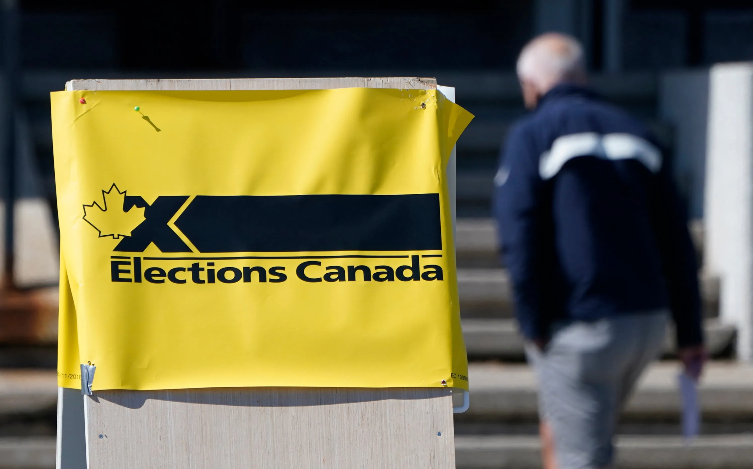 A man enters an advance polling station in Ottawa, Sept. 10, 2021. Advance polls opened today ahead of the Sept. 20 federal election. (CP/Adrian Wyld) Canadian Election Results Map