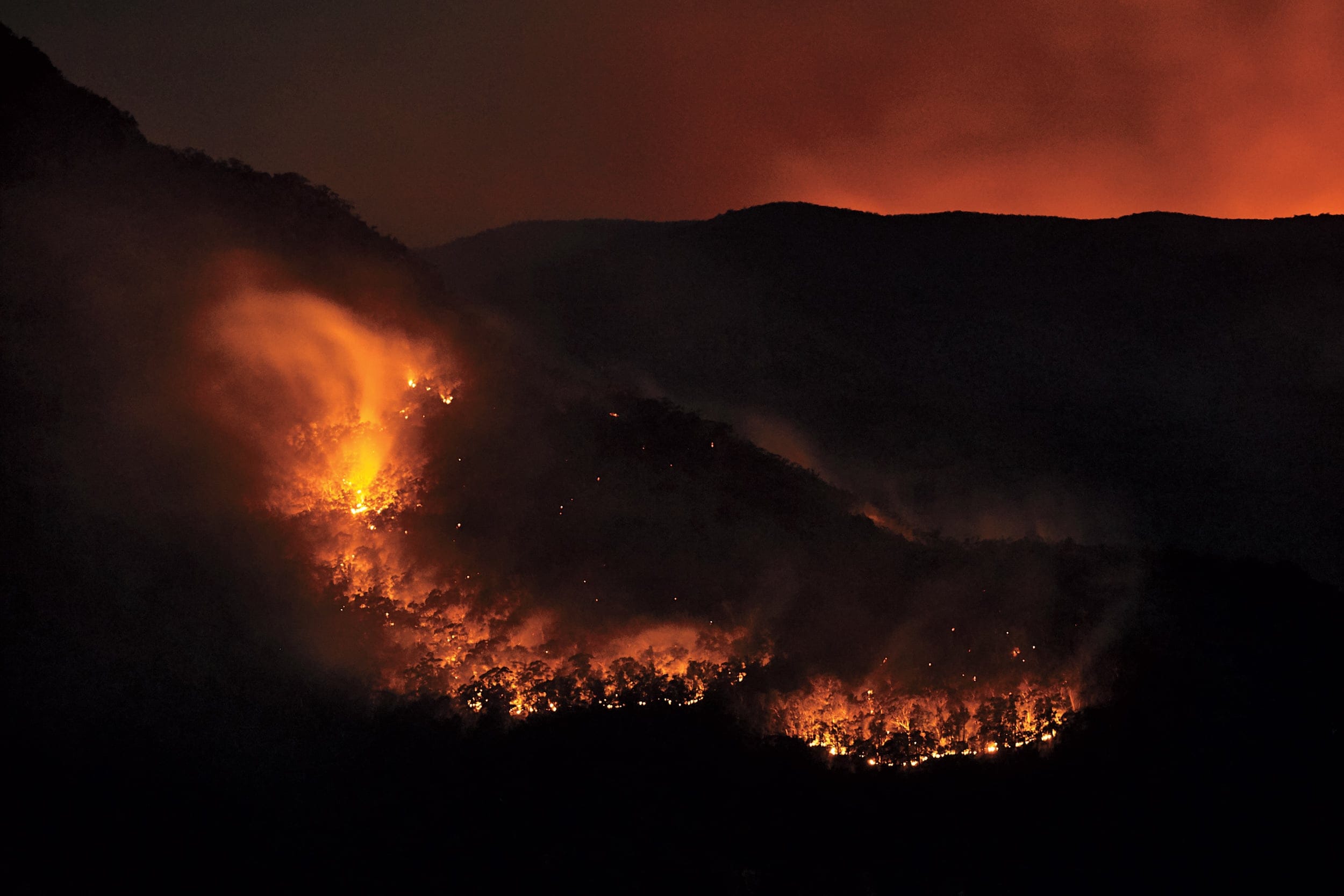 People in Katoomba, Australia, saw these scattered bushfires on the horizon in December 2019 (Brett Hemmings/Getty Images)