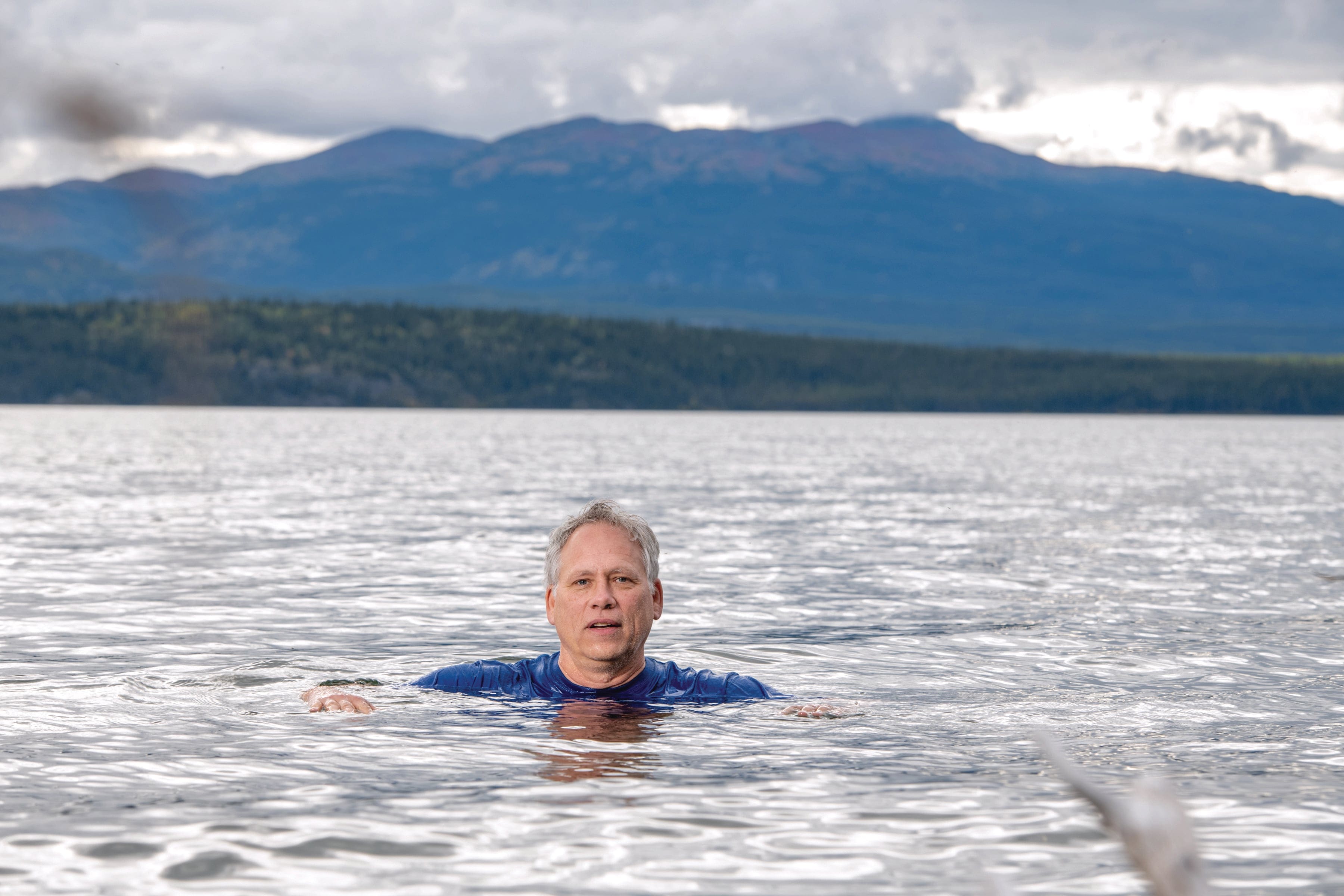 Streicker in Marsh Lake; the Yukon minister went all in on warning people about high water levels (Photograph by Cathie Archbould)