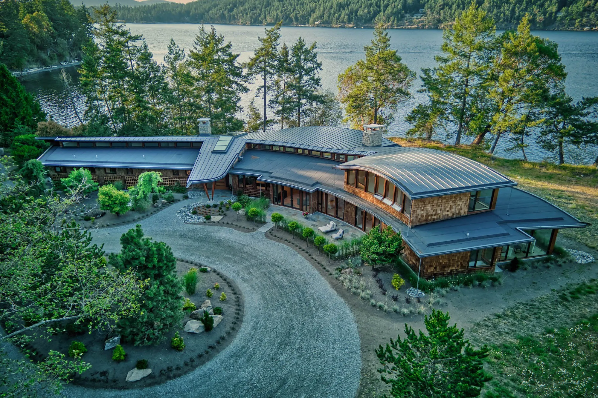 The exterior of Point House, curving to the shore line