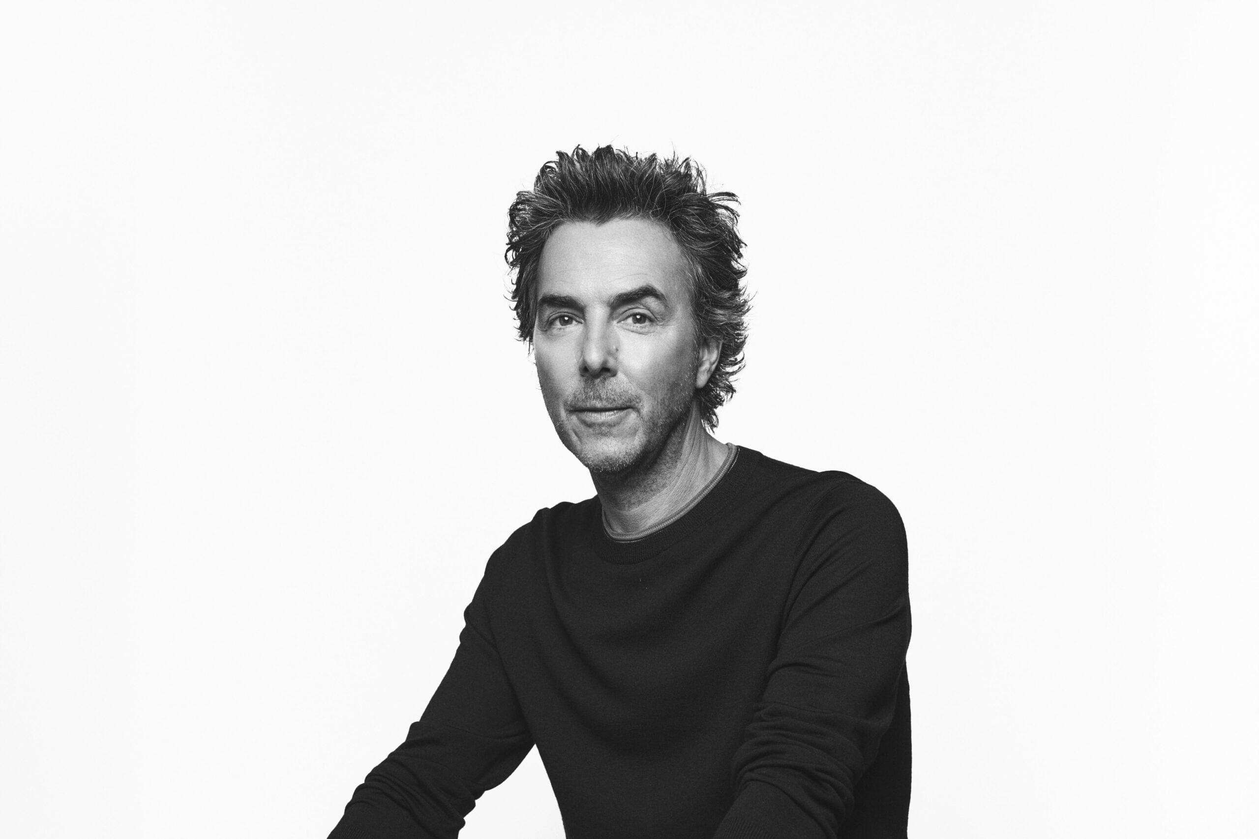 Shawn Levy in a black long sleeved top