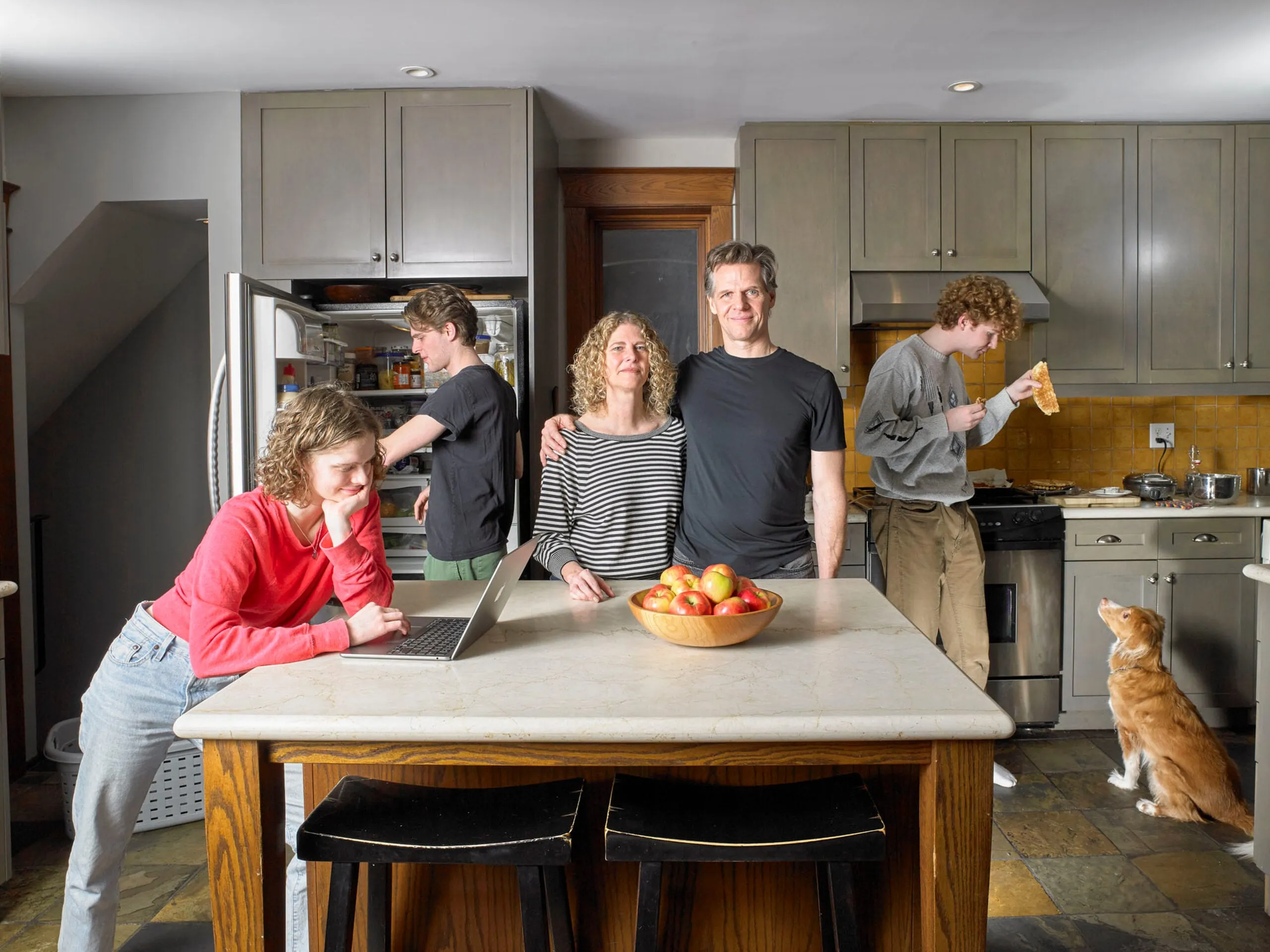 A family in their kitchen
