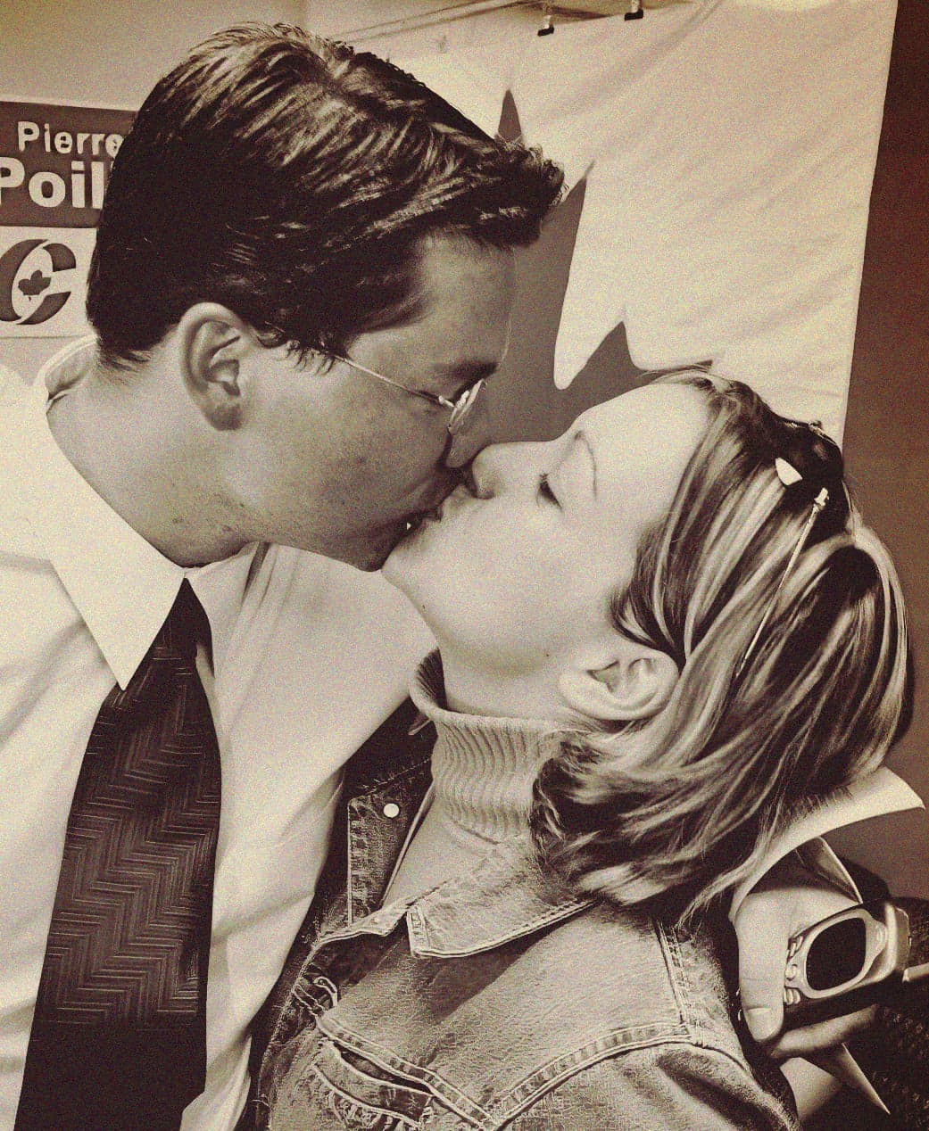A man and a woman kissing