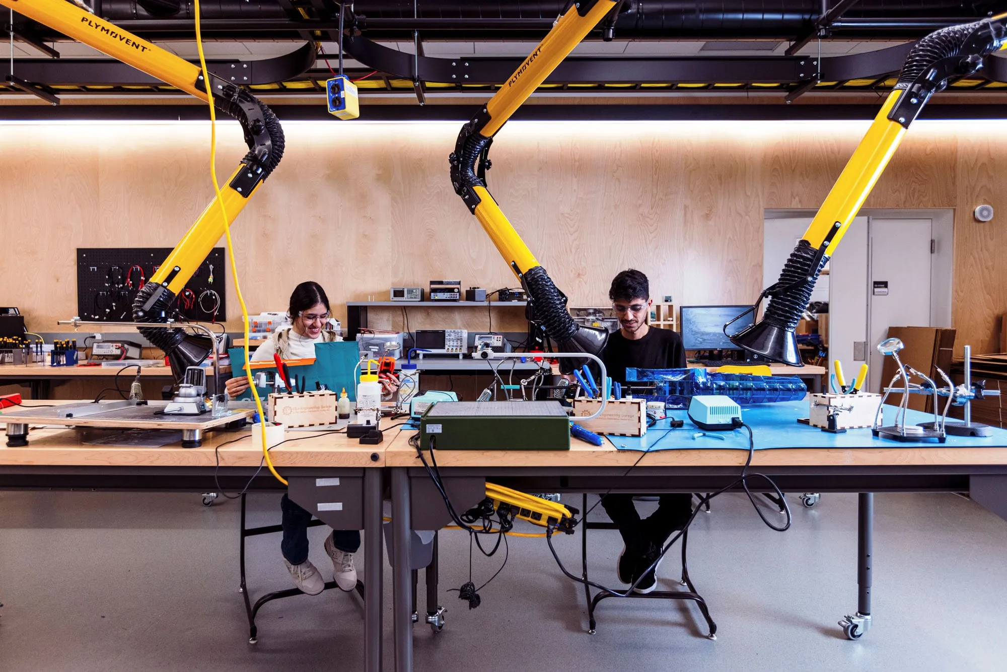 Engineering students working at a table