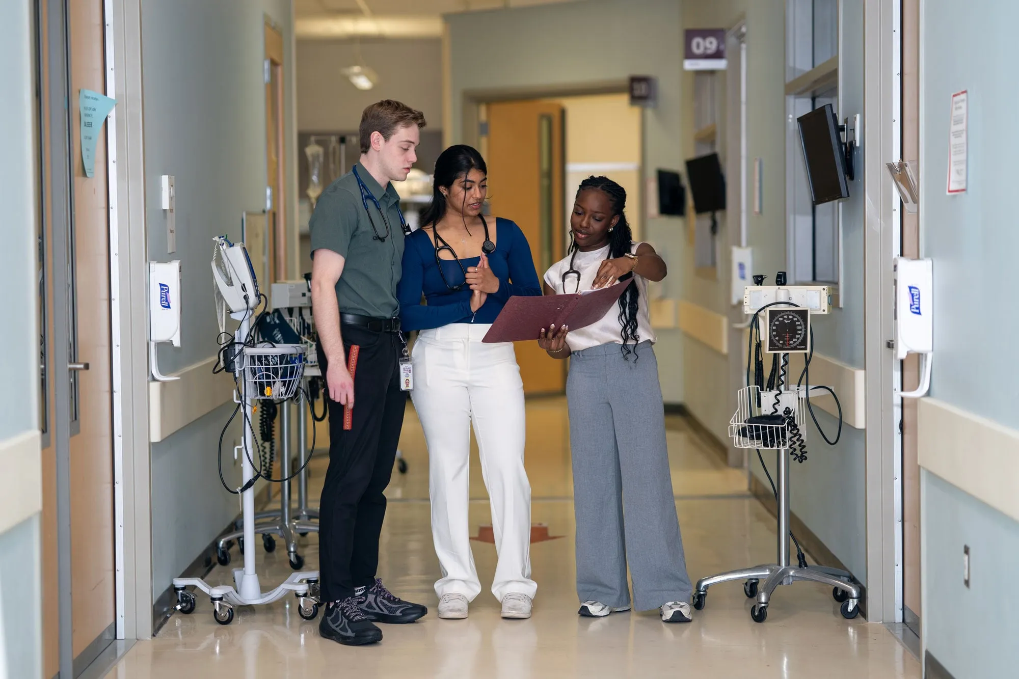 Students in McMaster’s bachelor of health sciences program consult with a professor