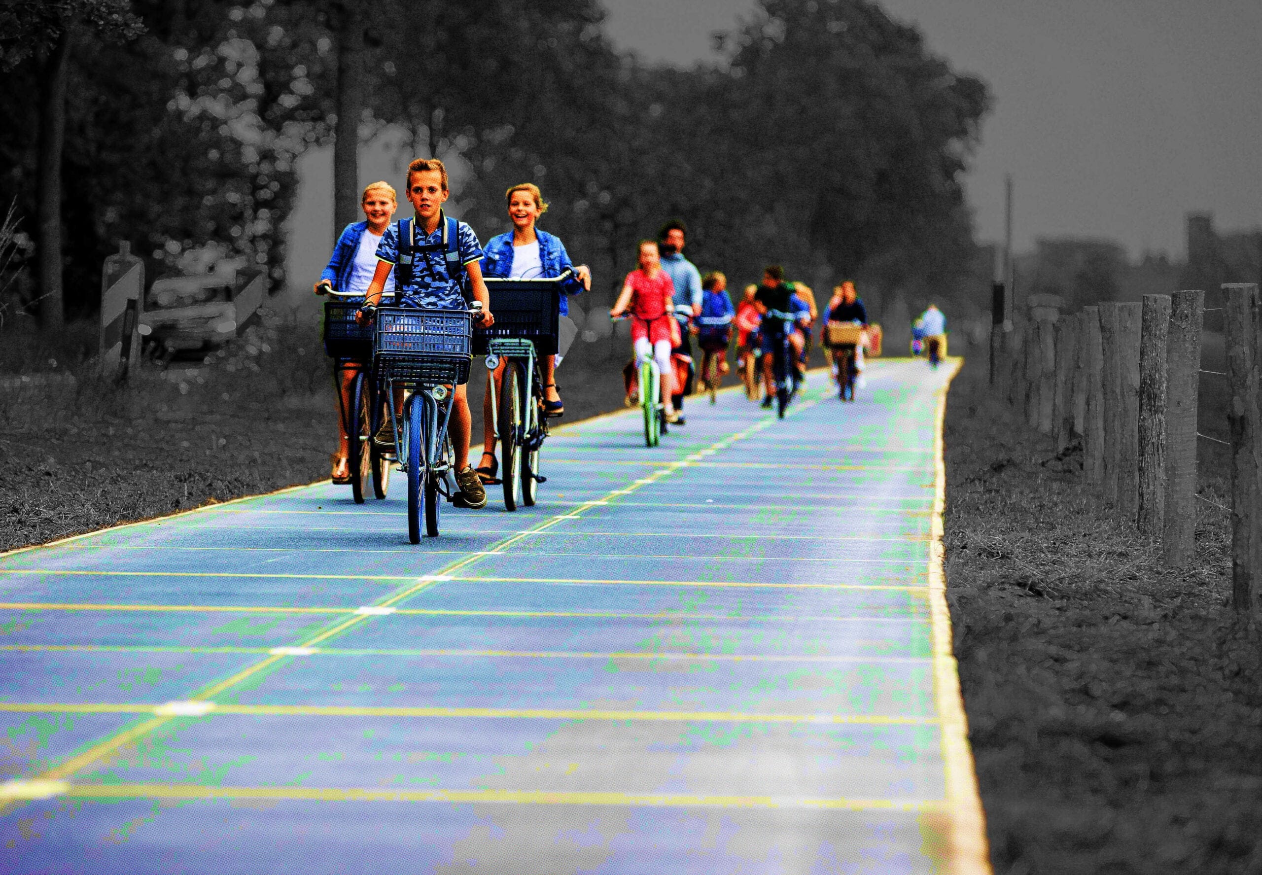 Cyclists on a solar panel