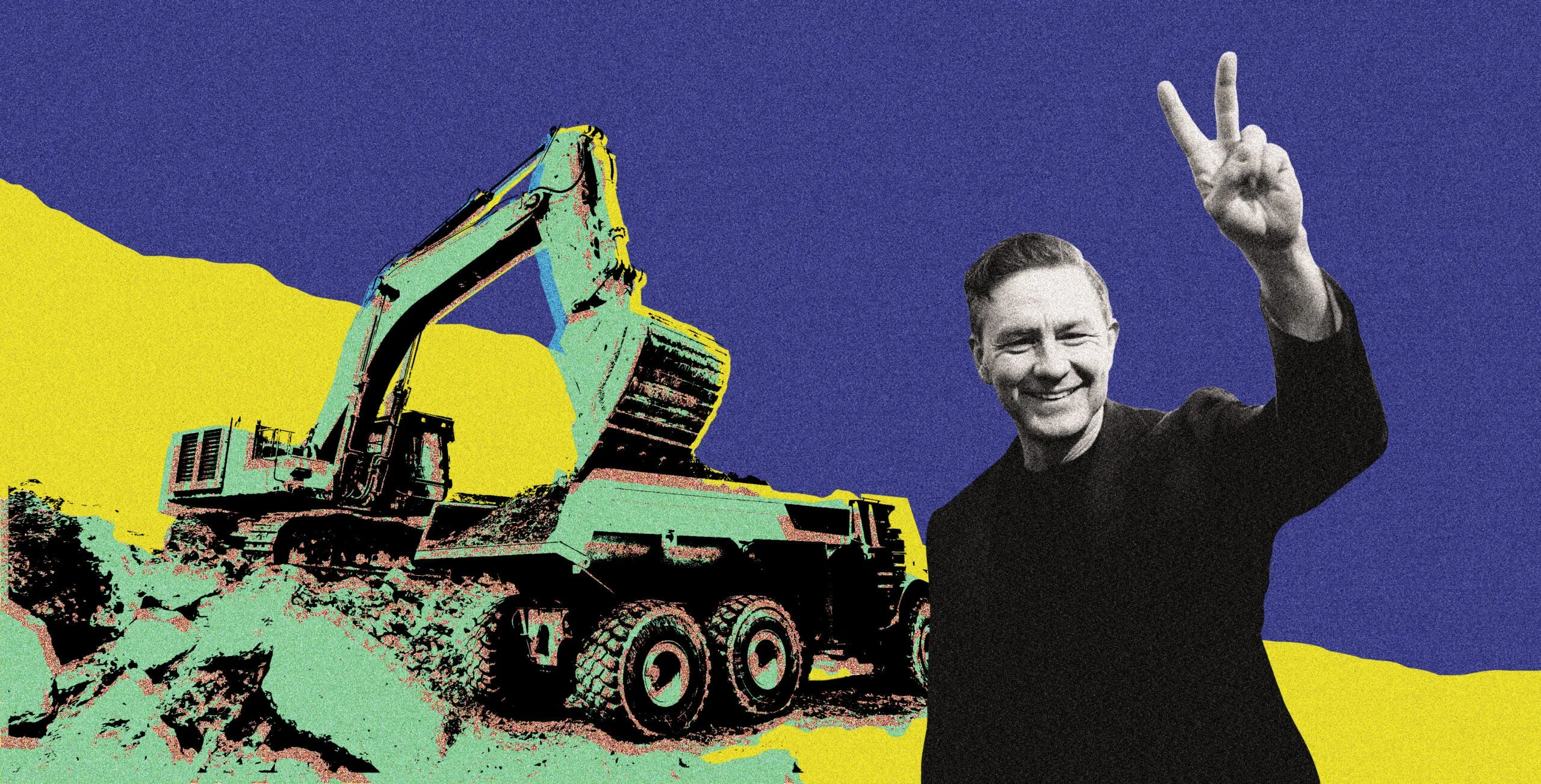 A smiling man beside a mining truck