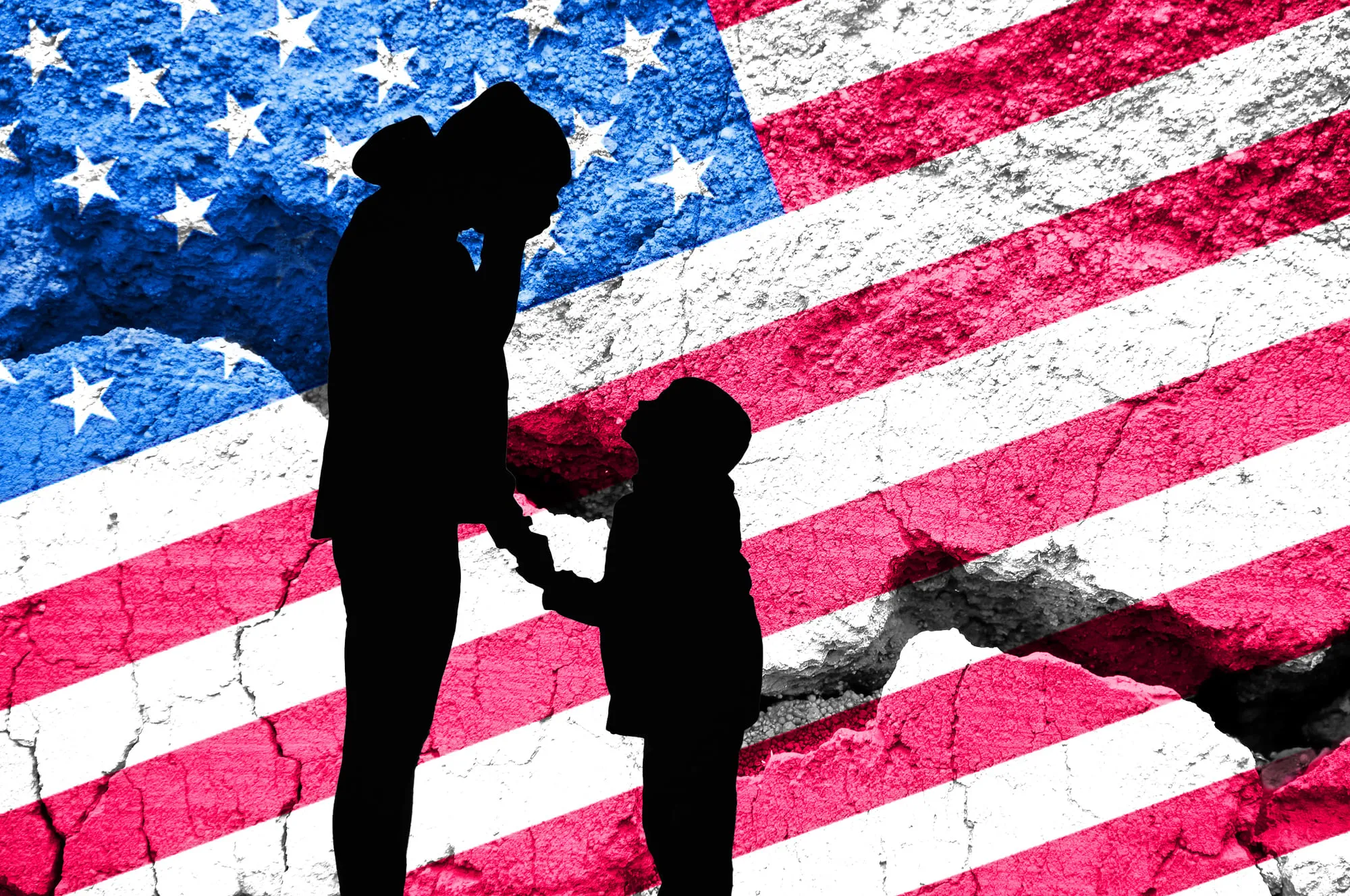 An American flag with a crack through it, and the silhouettes of a person and child in front