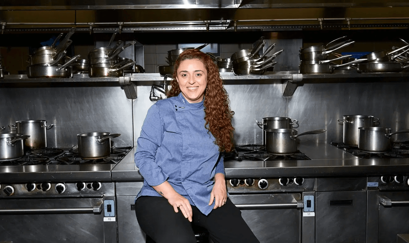 Portrait of Flavia Campelo Michelstadter in a commercial kitchen