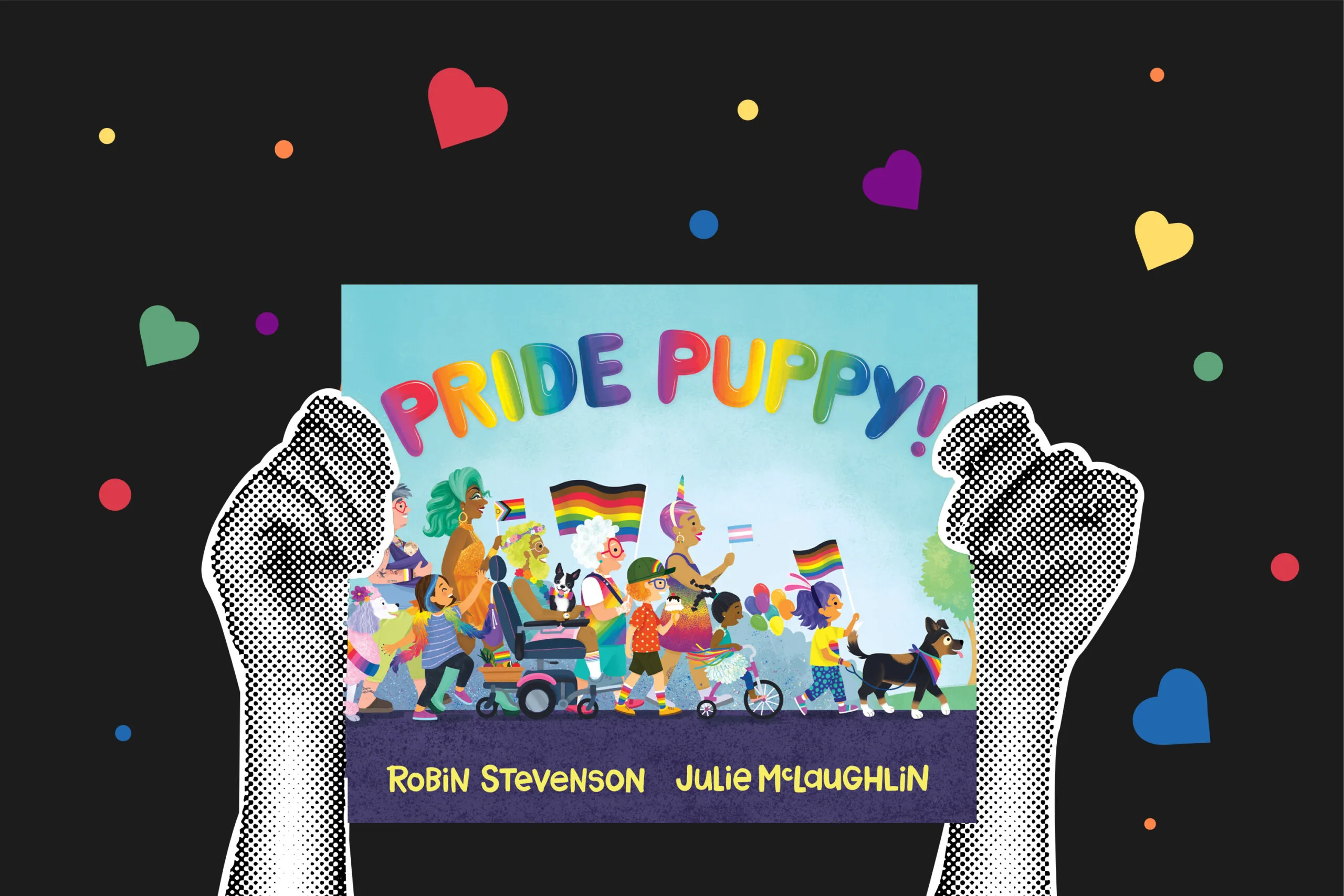 A pair of hands holding up a book that says "PRIDE PUPPY"