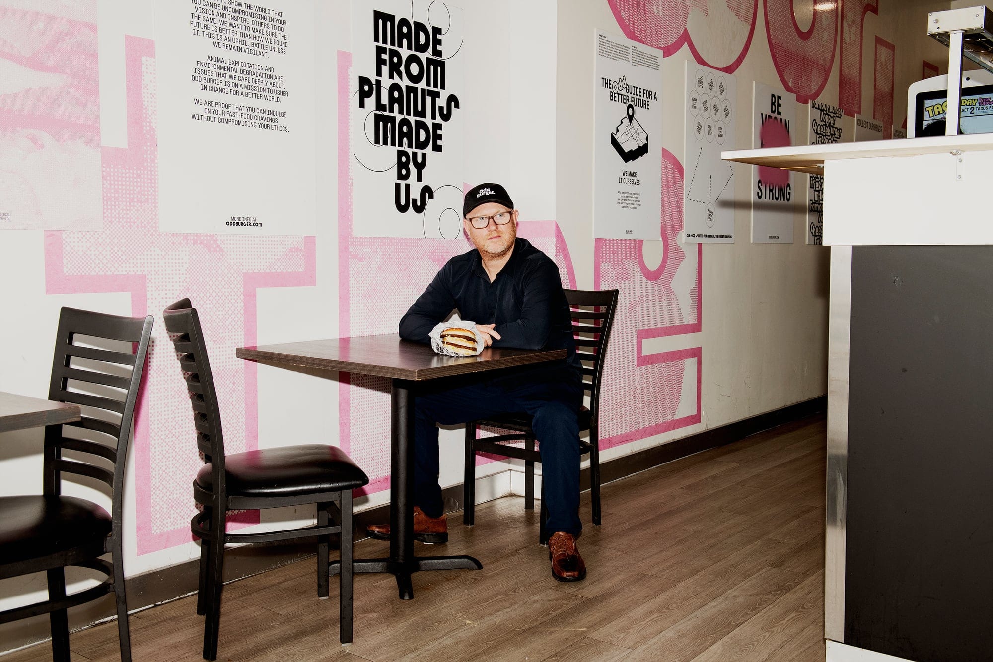 A man sitting at a restaurant table
