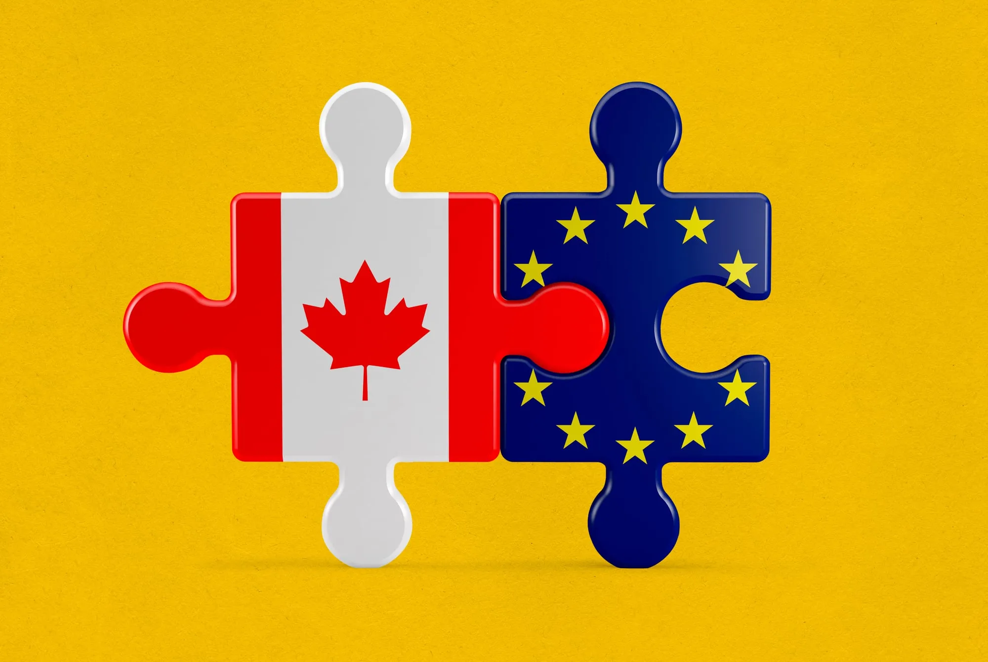 A puzzle piece representing the Canadian flag, with a maple leaf in the middle, slots into a puzzle piece with yellow stars on a blue background, representing the European Union