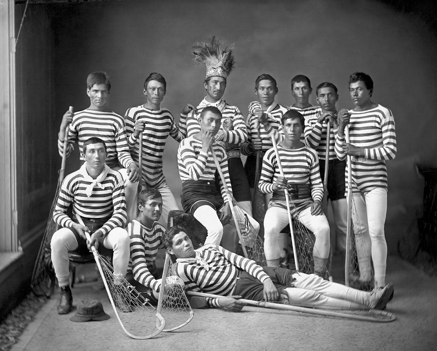A group of people in striped shirts
