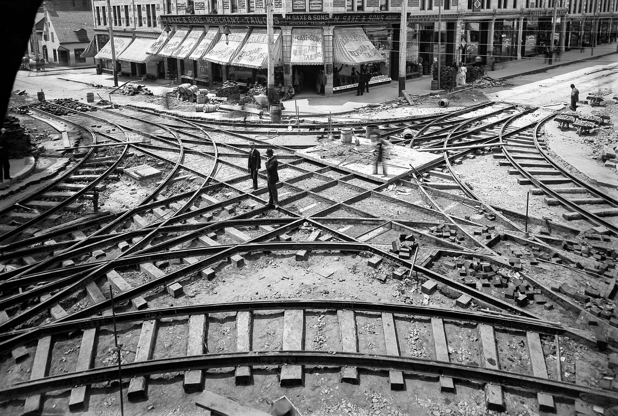 Multiple overlapping train tracks photographed from above