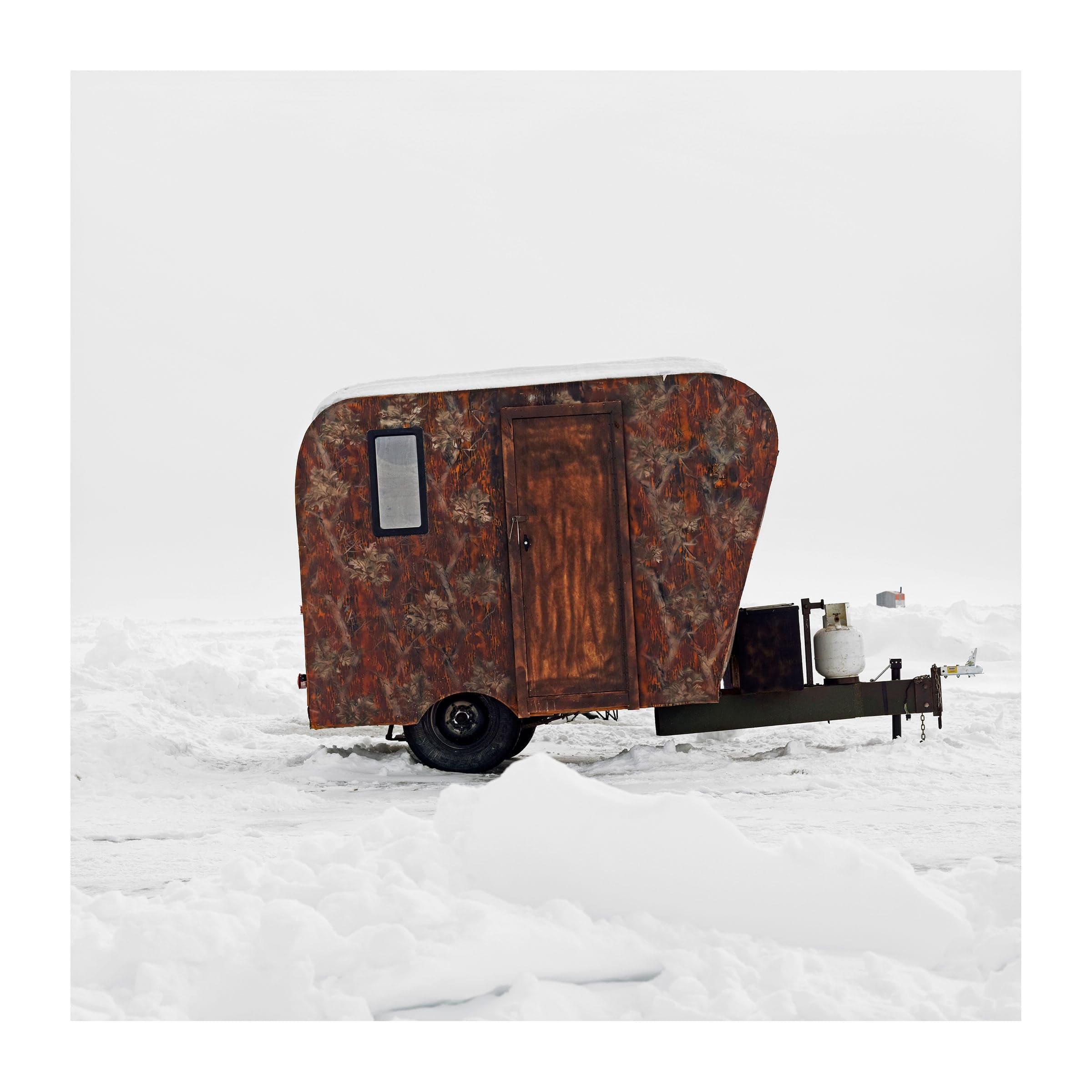 A repurposed trailer admist the winter