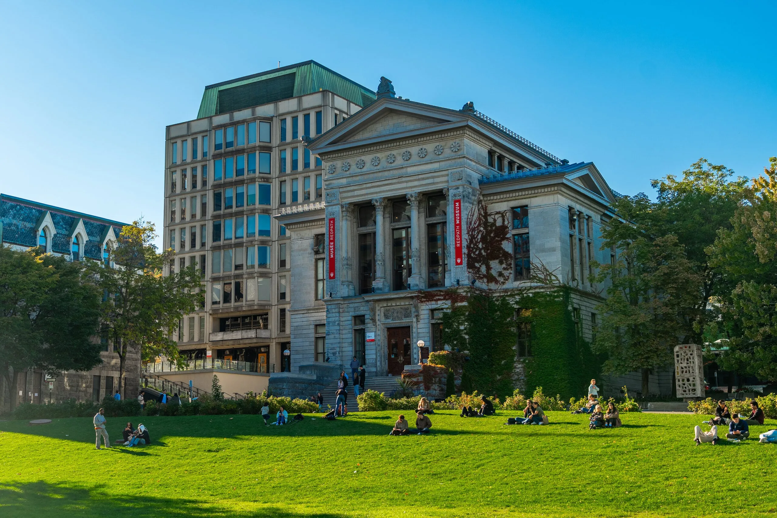 A building at McGill University facing a green lawn