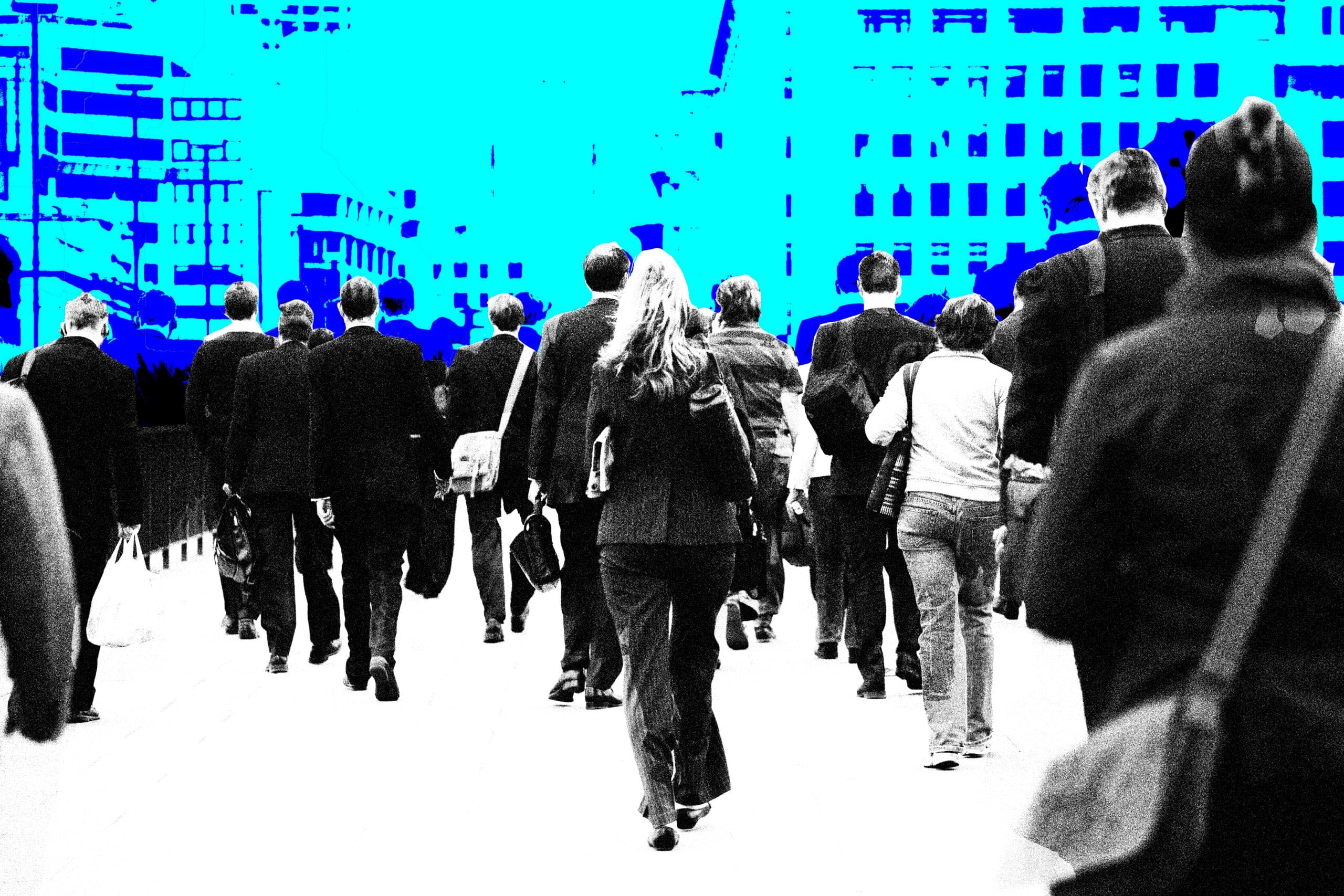 A group of people in office clothes, walking away from the camera