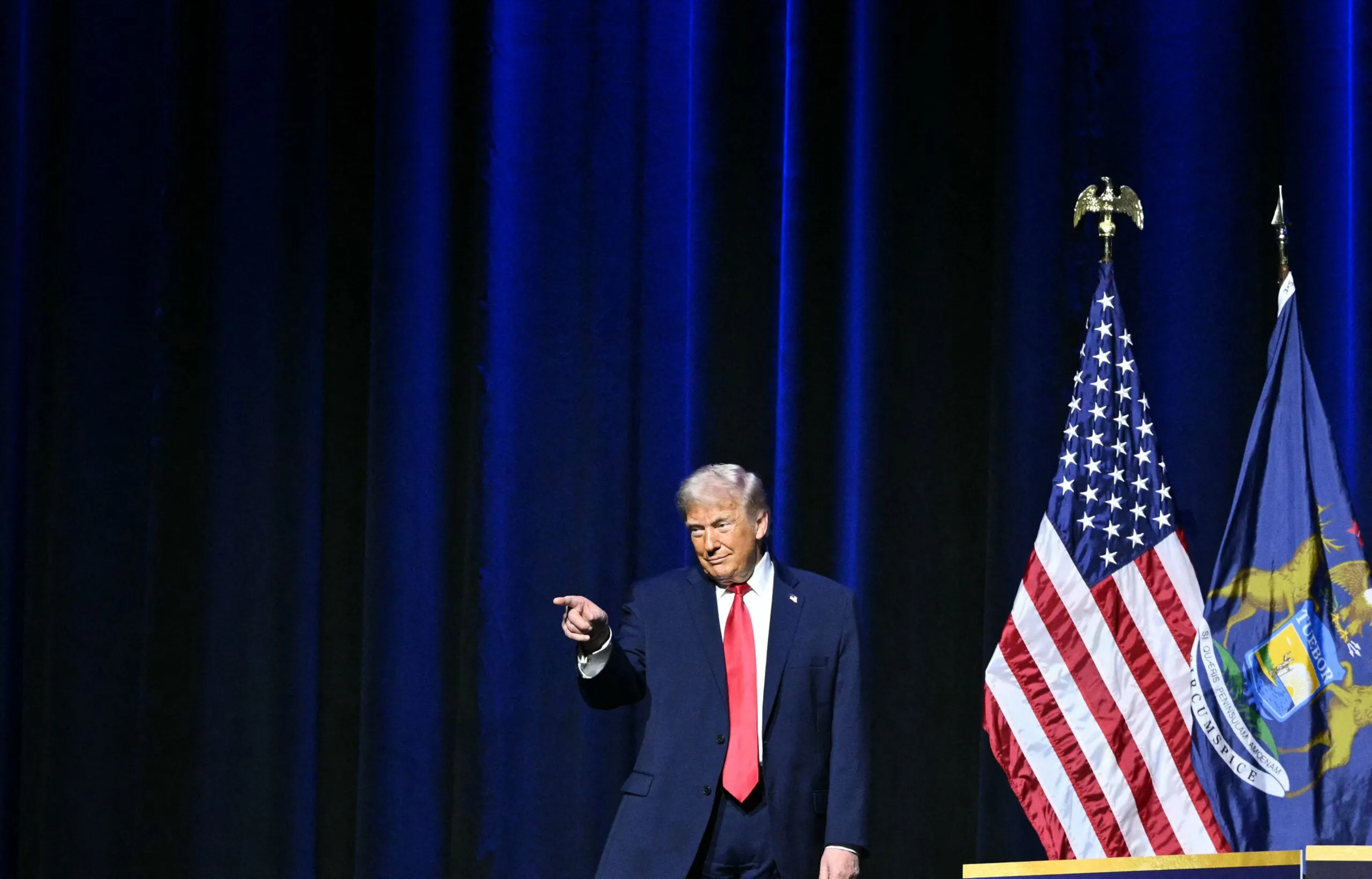 Donald Trump in front of an American flag